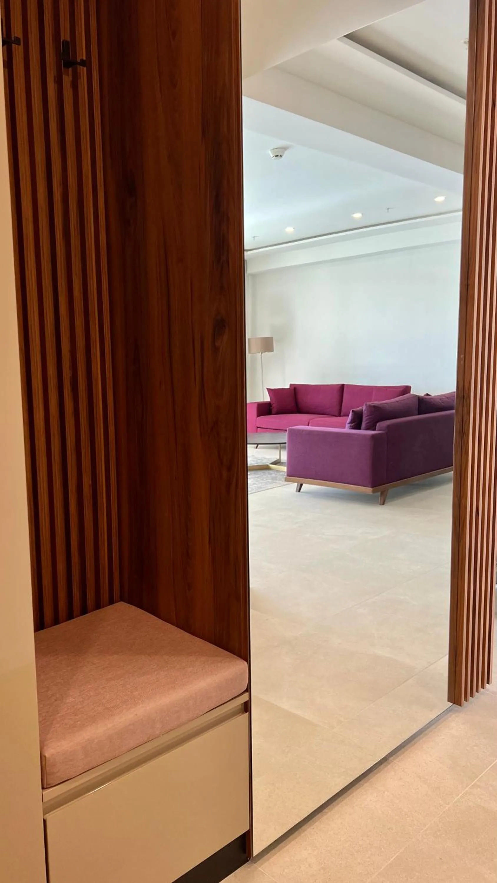 Seating area, Bed in Sunraf Luxe Apartments