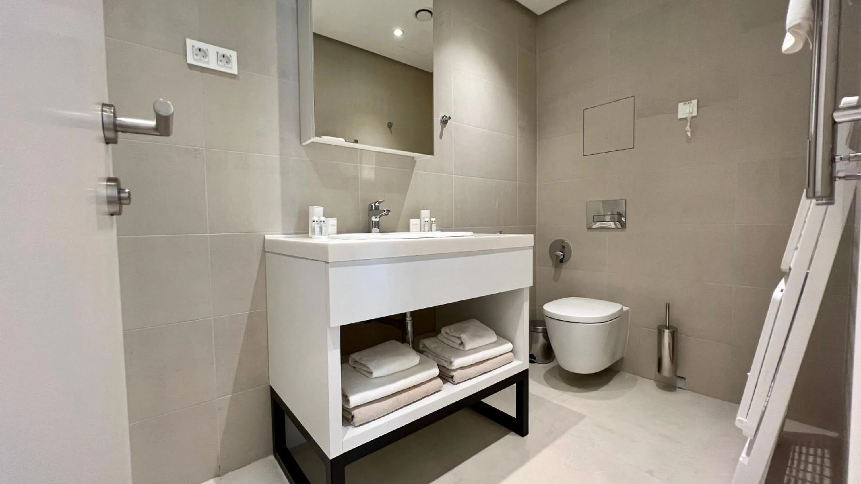 Toilet in Sunraf Luxe Apartments