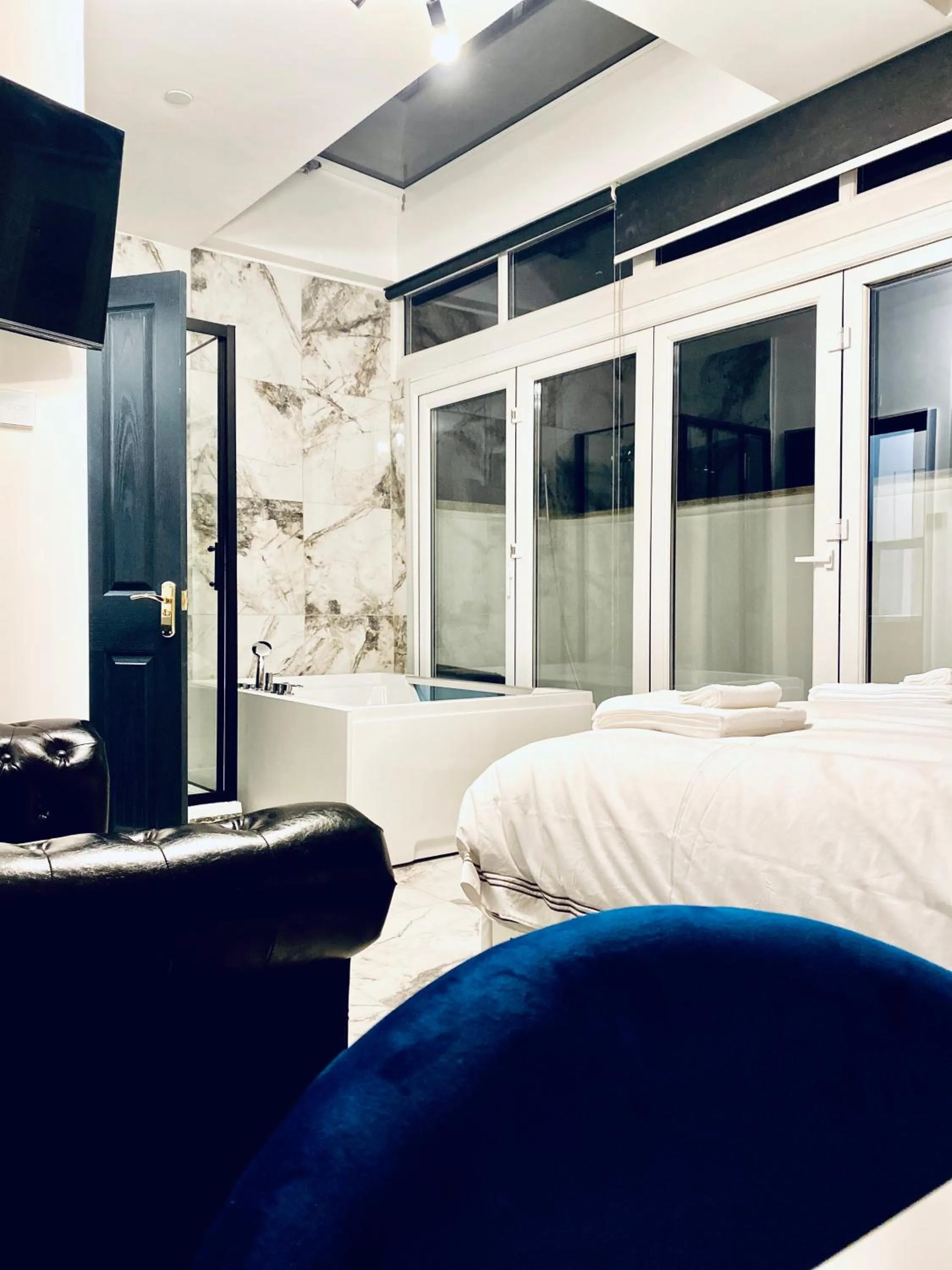 Bed in Duke and Duchess Apartments and Rooms - Private in Room Hot Tub Suites