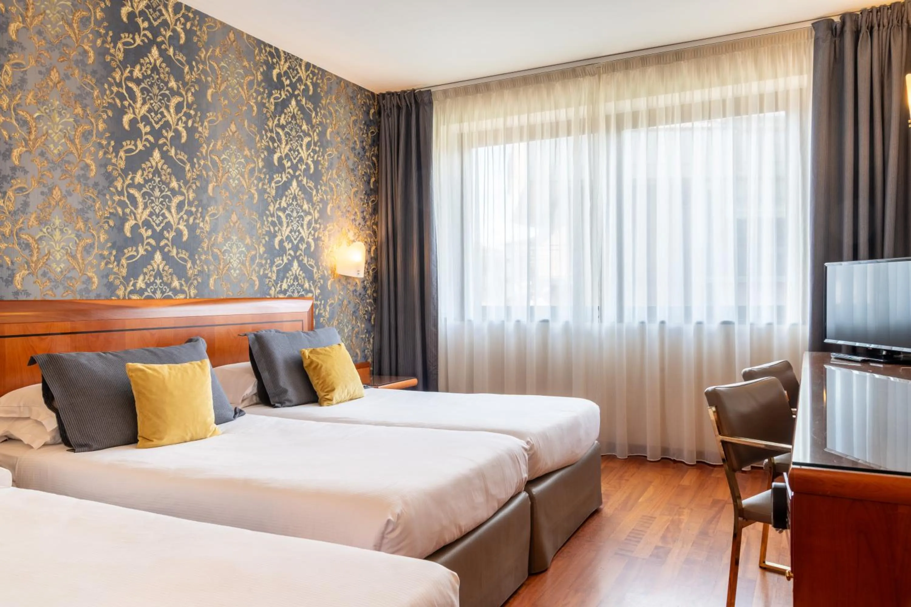 Bed in Hotel Palace Verona