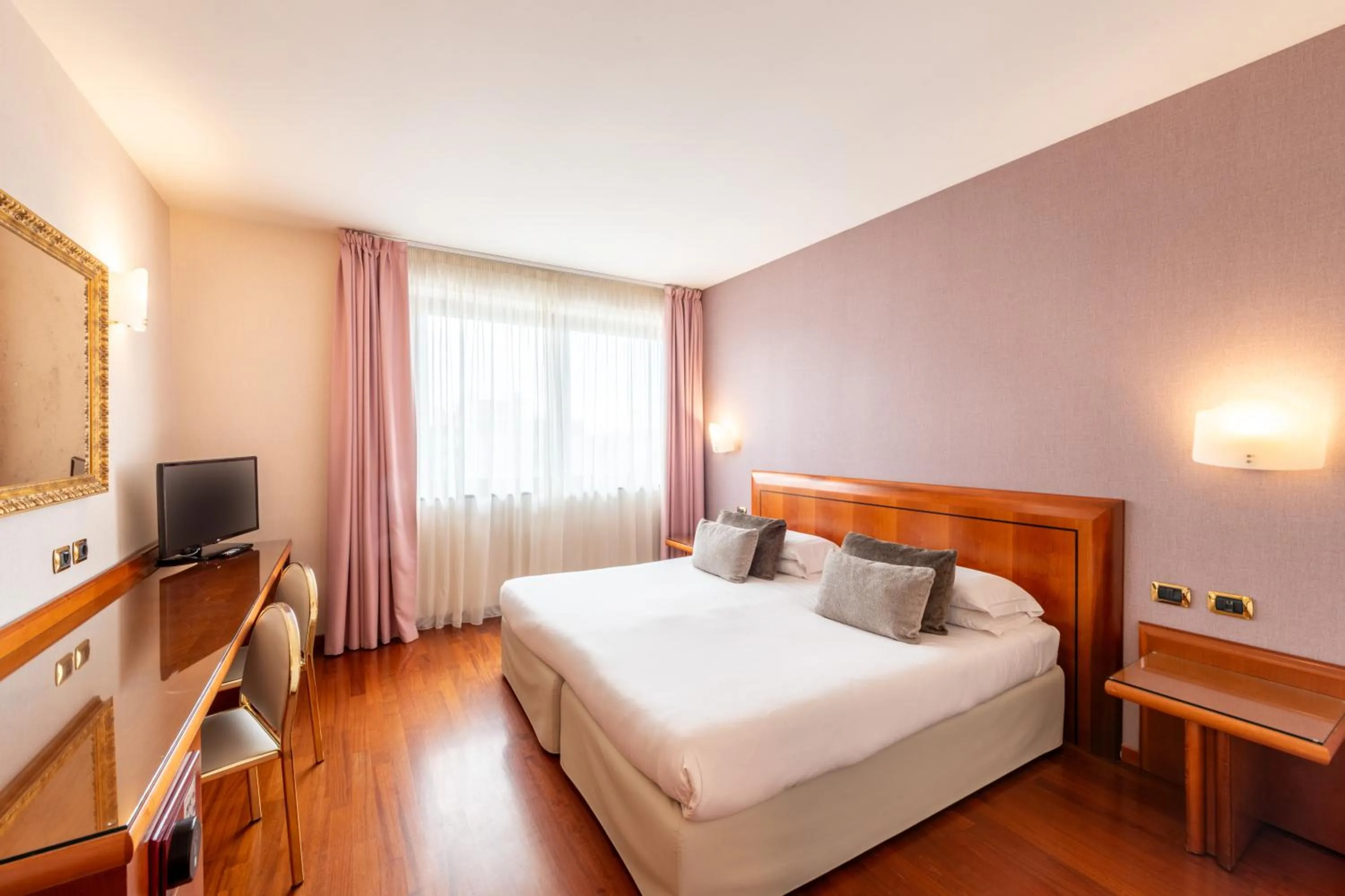 Bed in Hotel Palace Verona