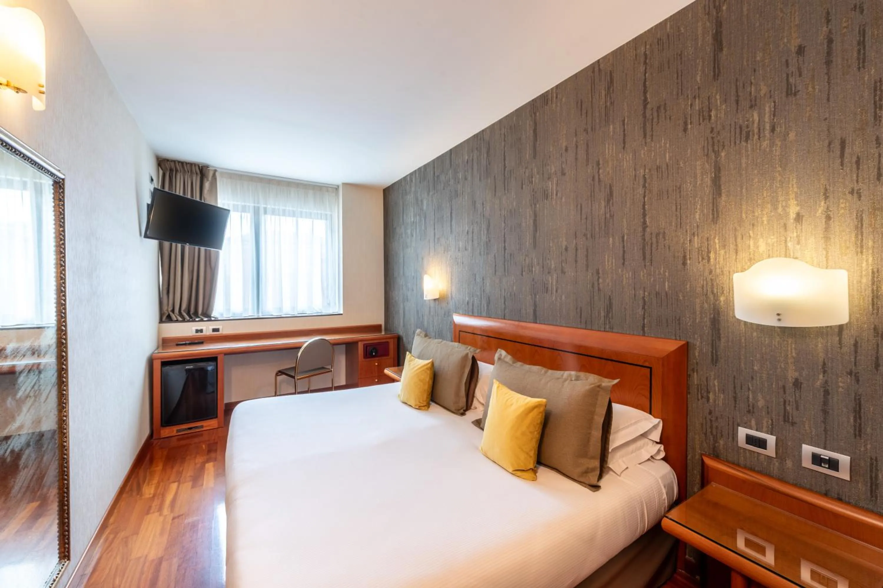 Bed in Hotel Palace Verona