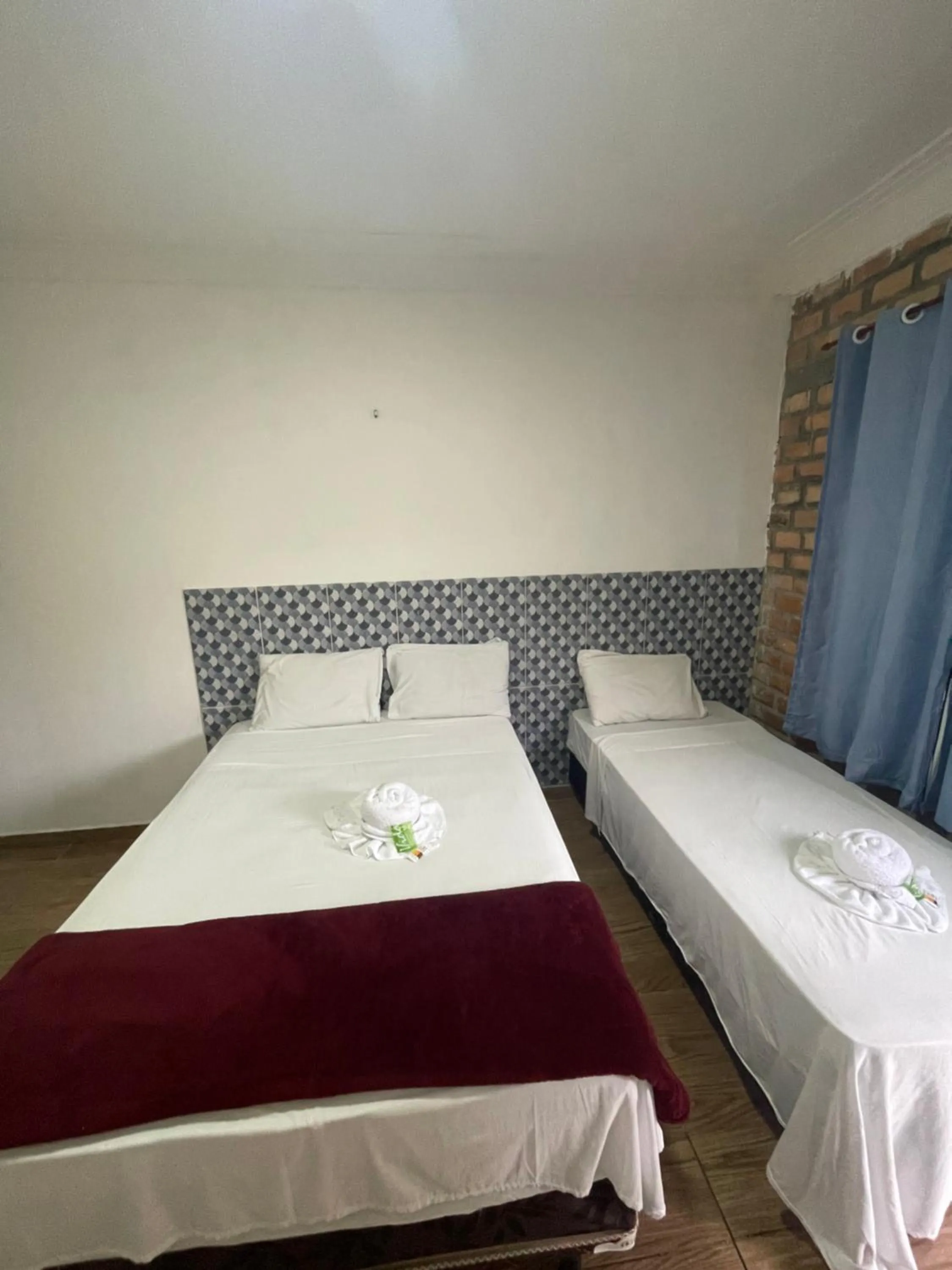 Bed in Pousada RIOSTOUR