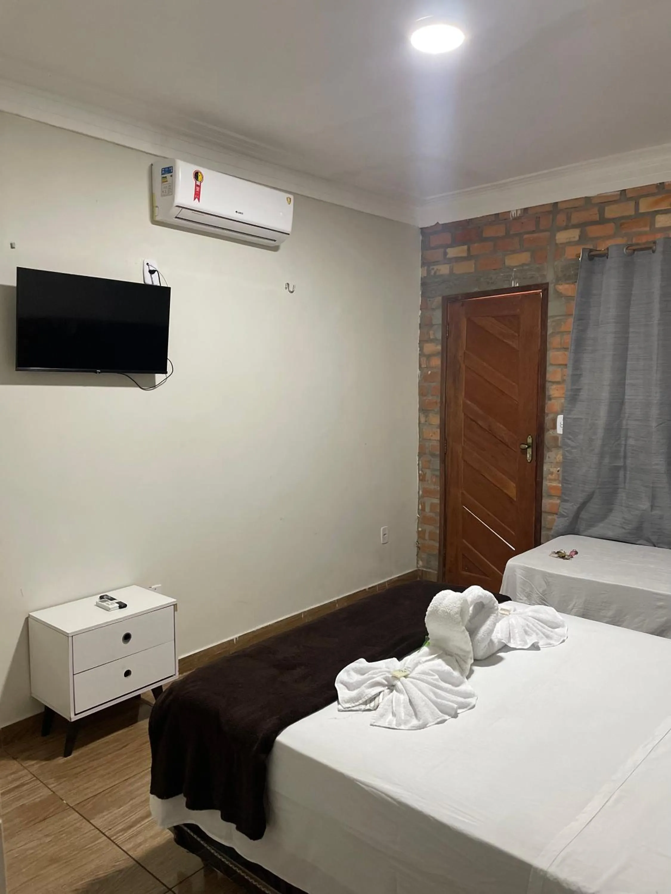 Bed in Pousada RIOSTOUR