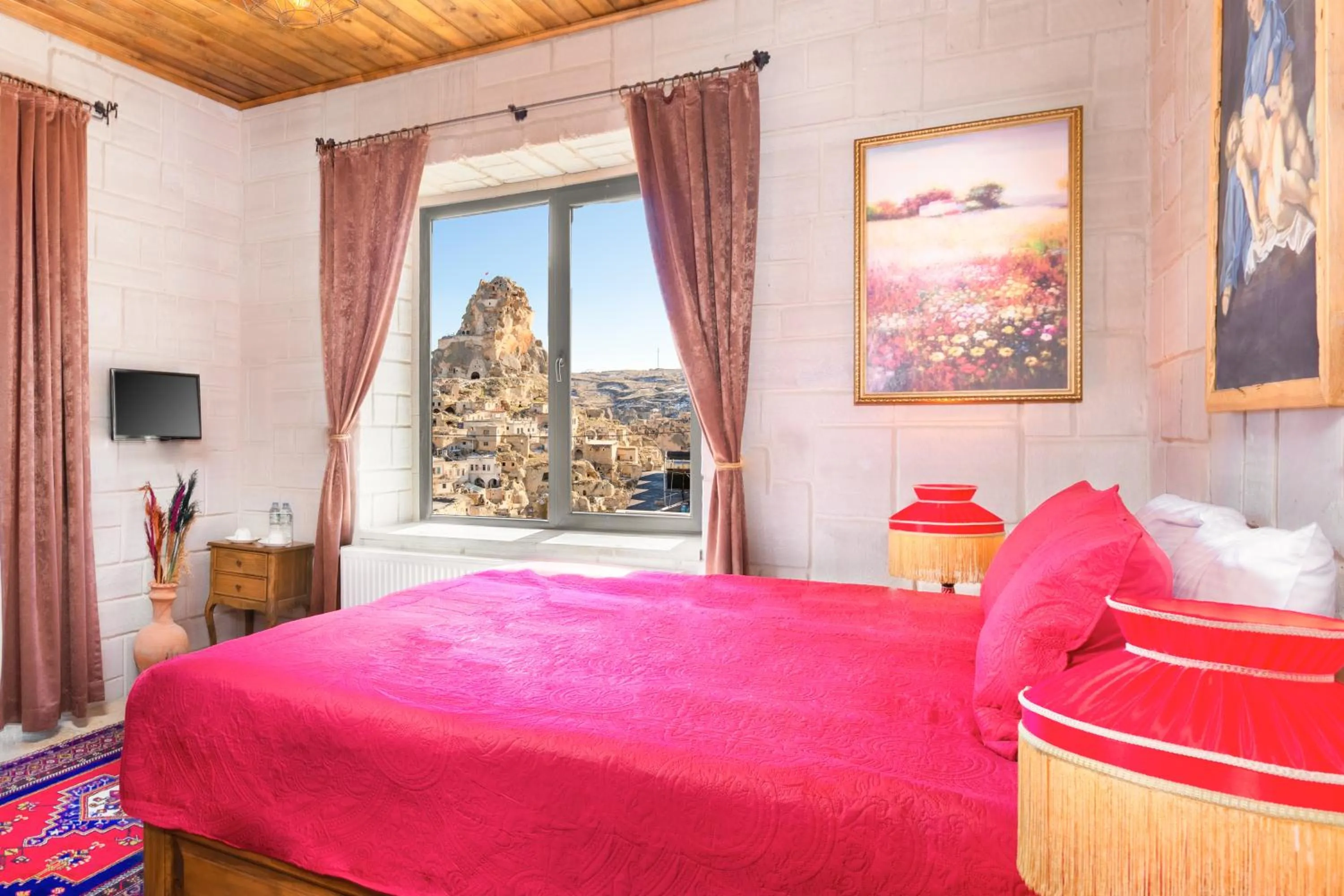 Bed in Megaron Cave Hotel Cappadocia