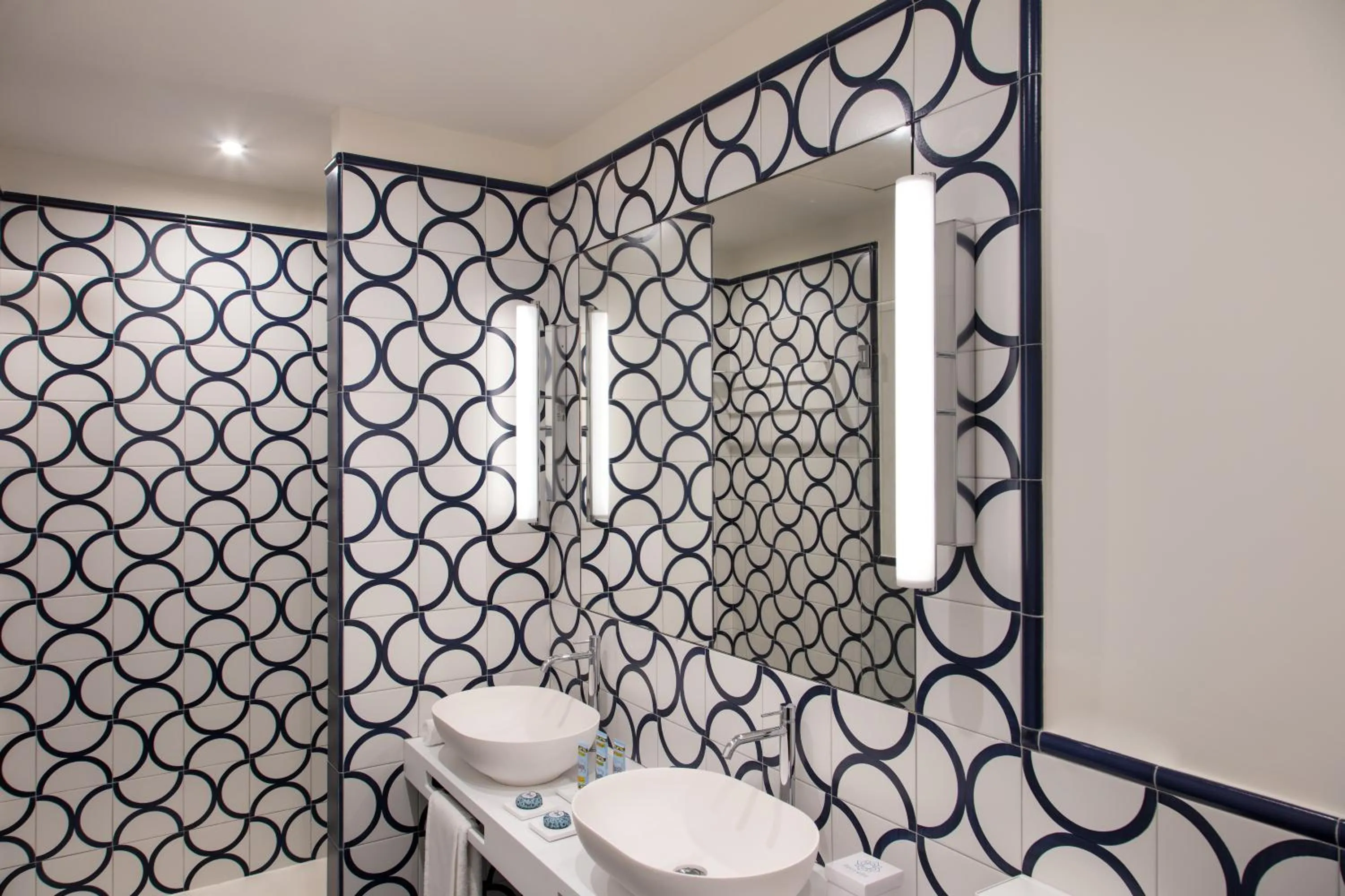 Bathroom in Pazziella Garden & Suites