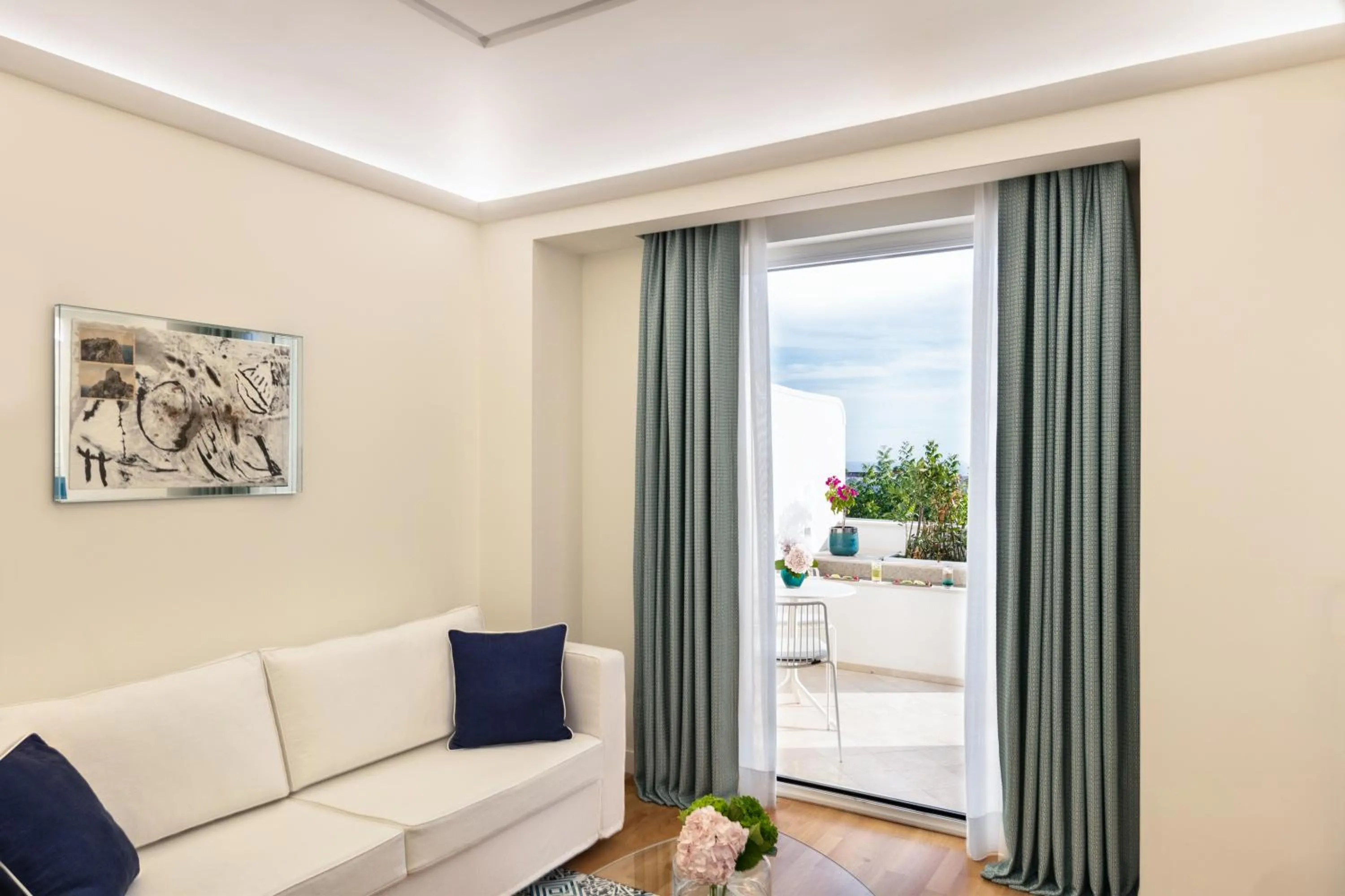 Seating area in Pazziella Garden & Suites