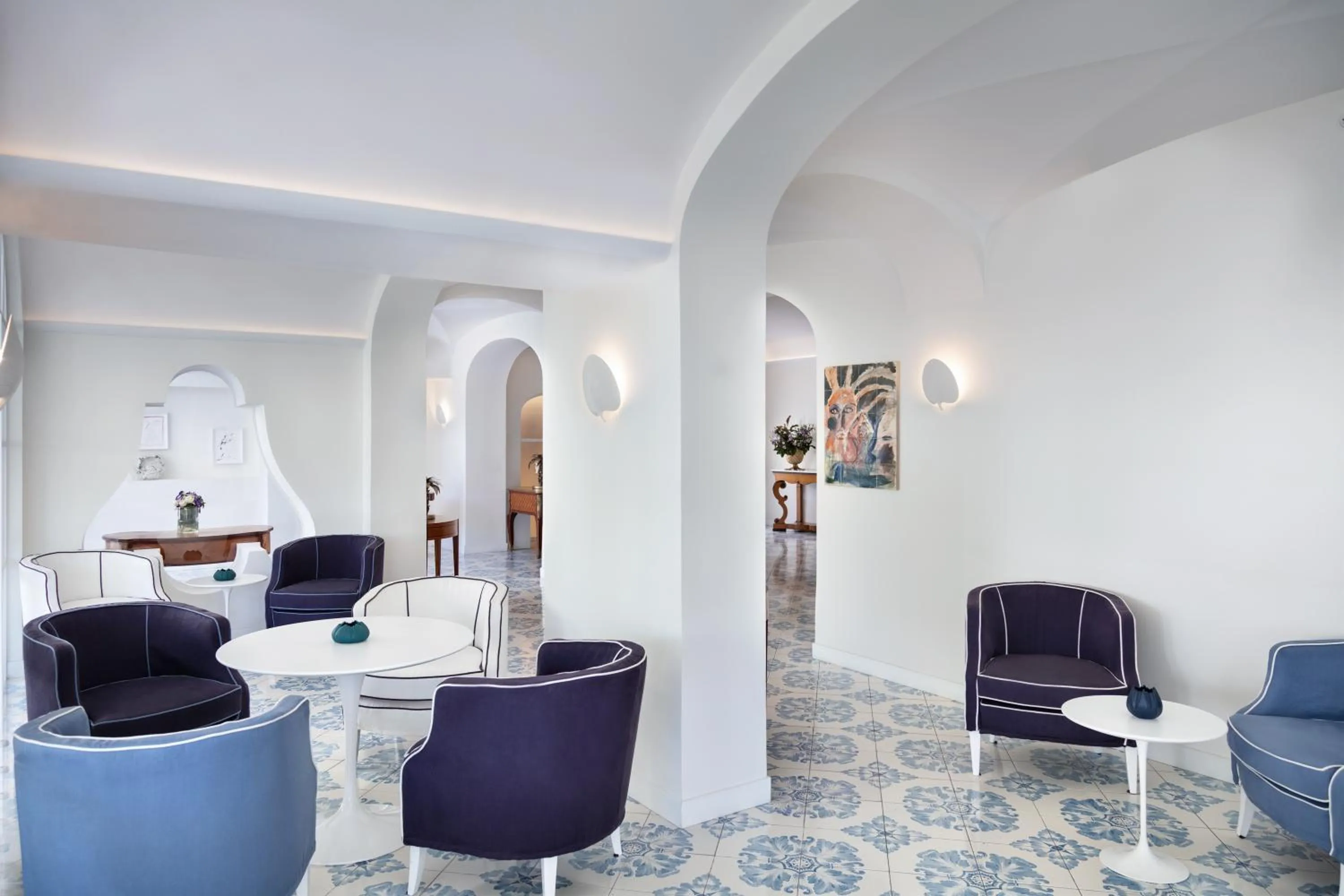 Lobby or reception in Pazziella Garden & Suites