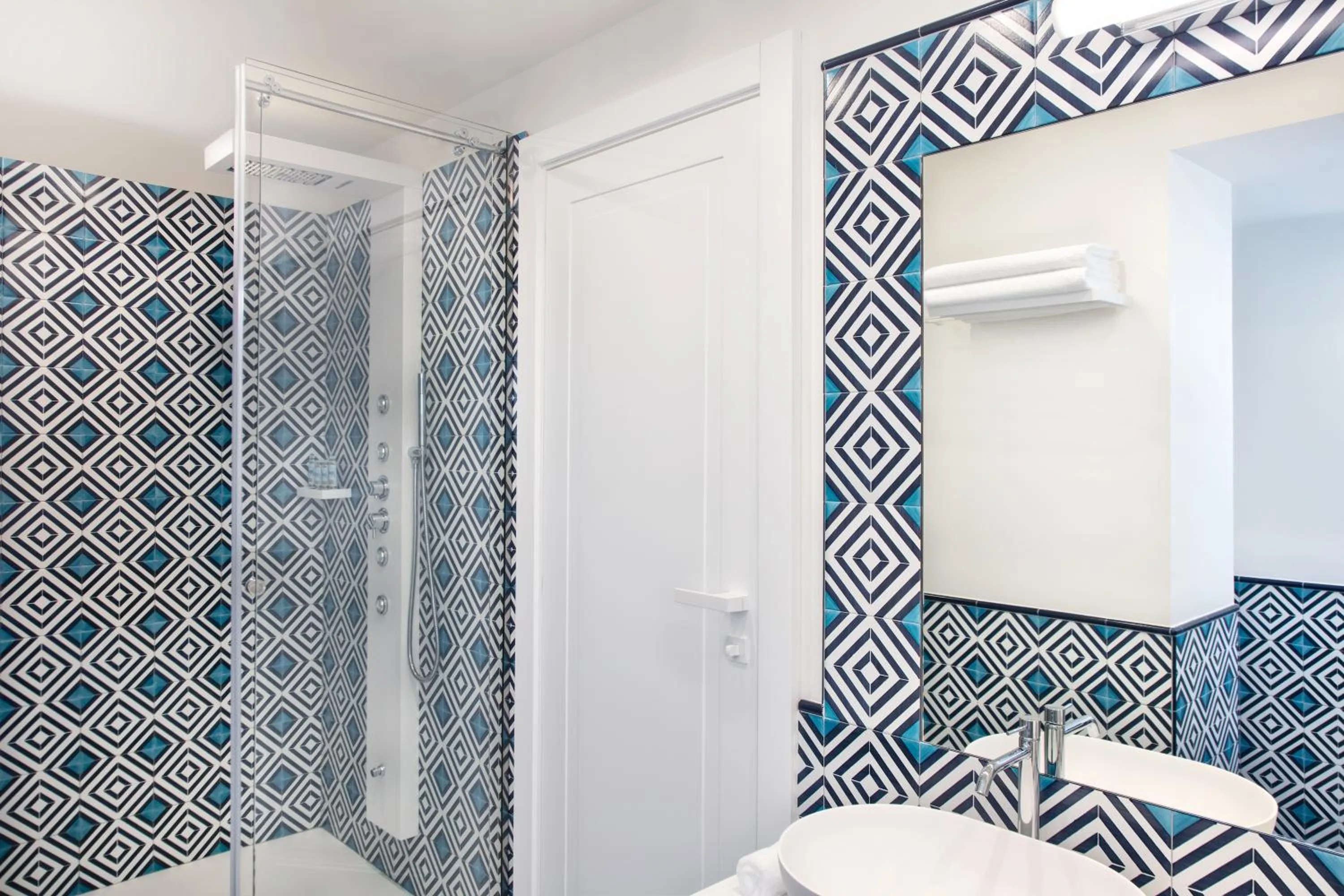 Bathroom in Pazziella Garden & Suites