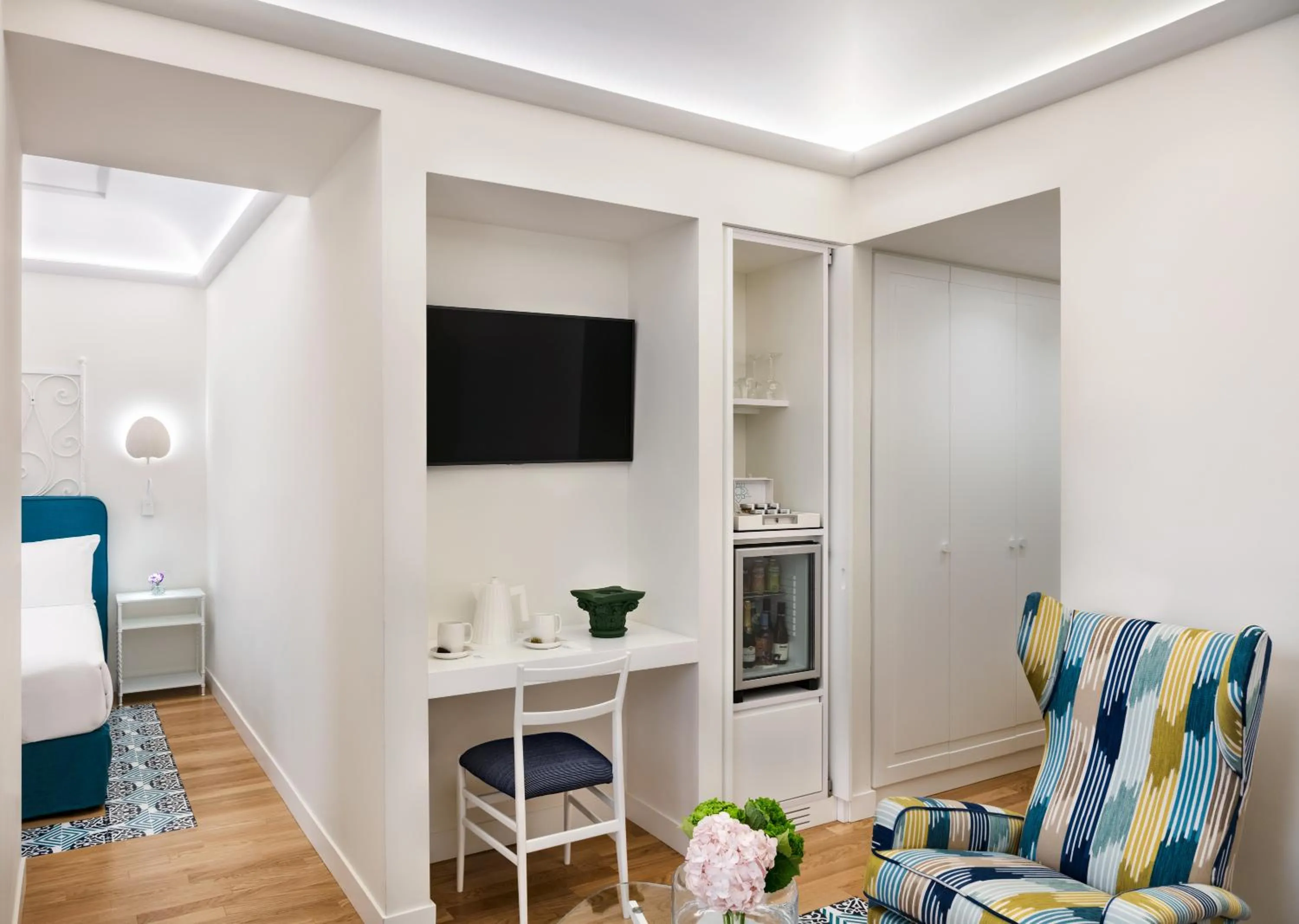 Bedroom in Pazziella Garden & Suites