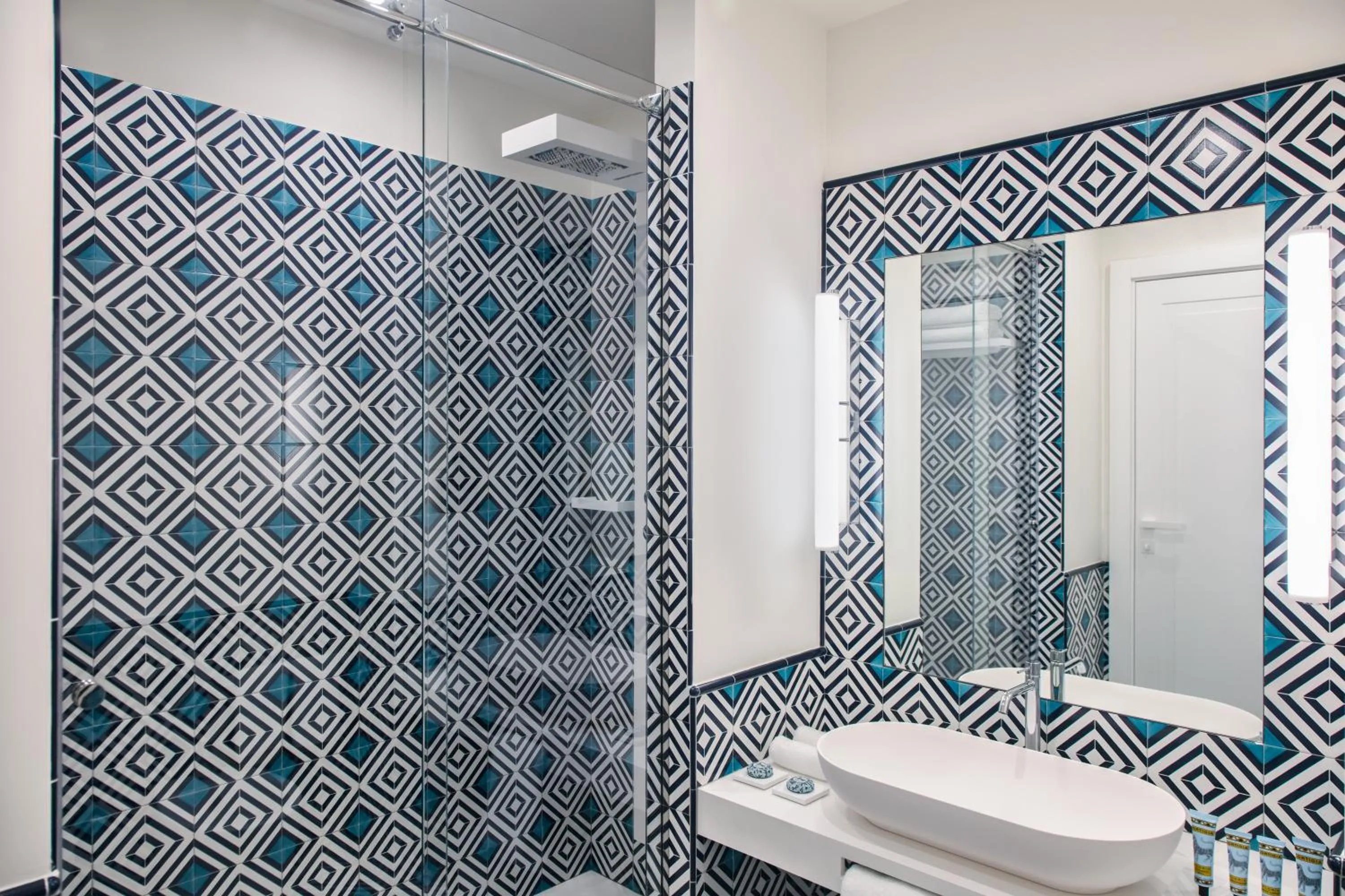 Bathroom in Pazziella Garden & Suites