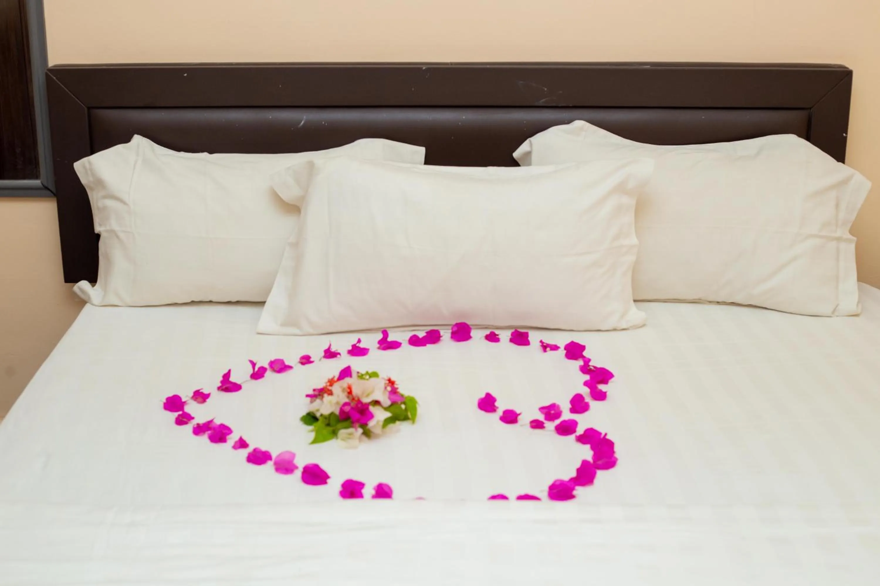 Bed in High Level Apartment