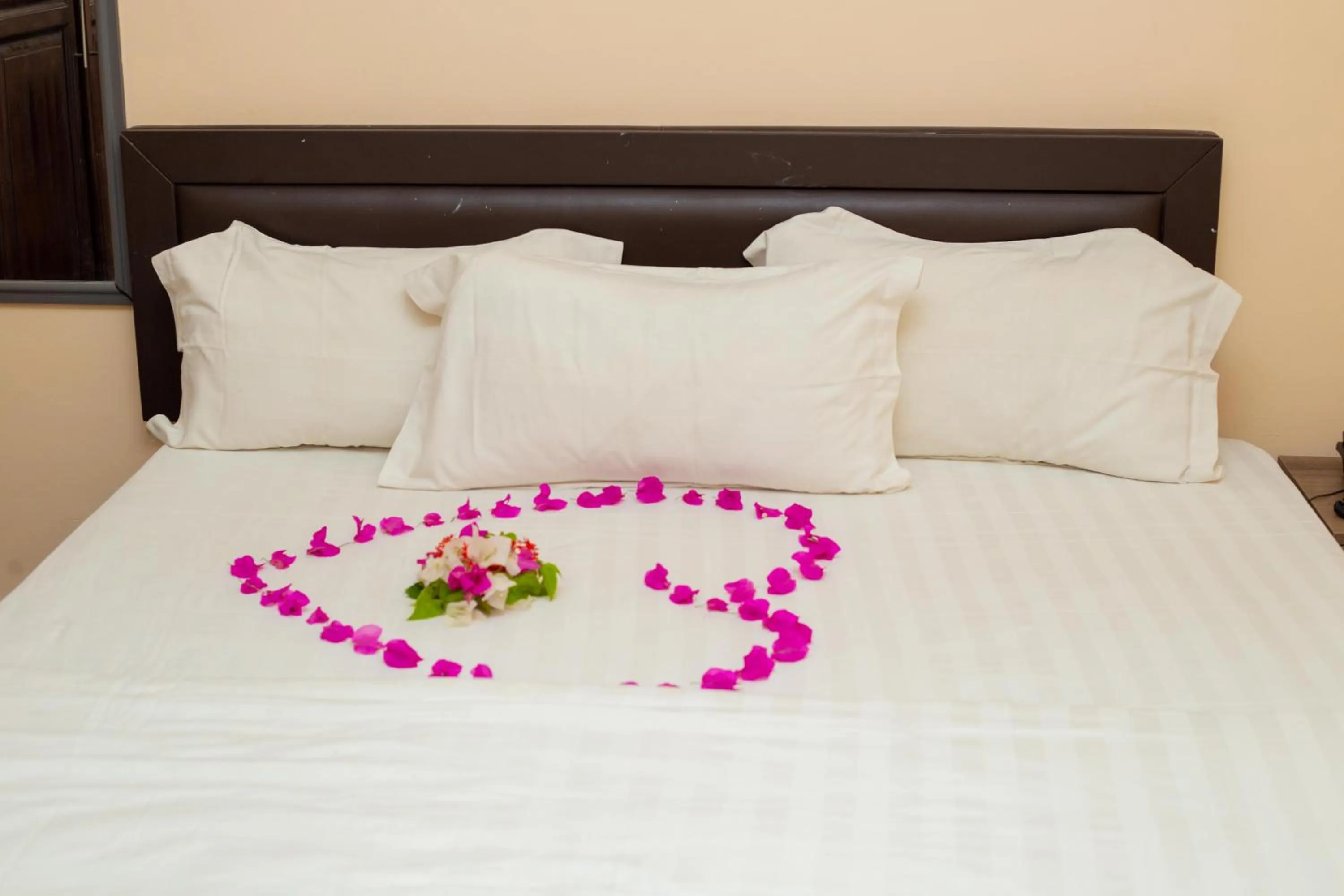 Bed in High Level Apartment