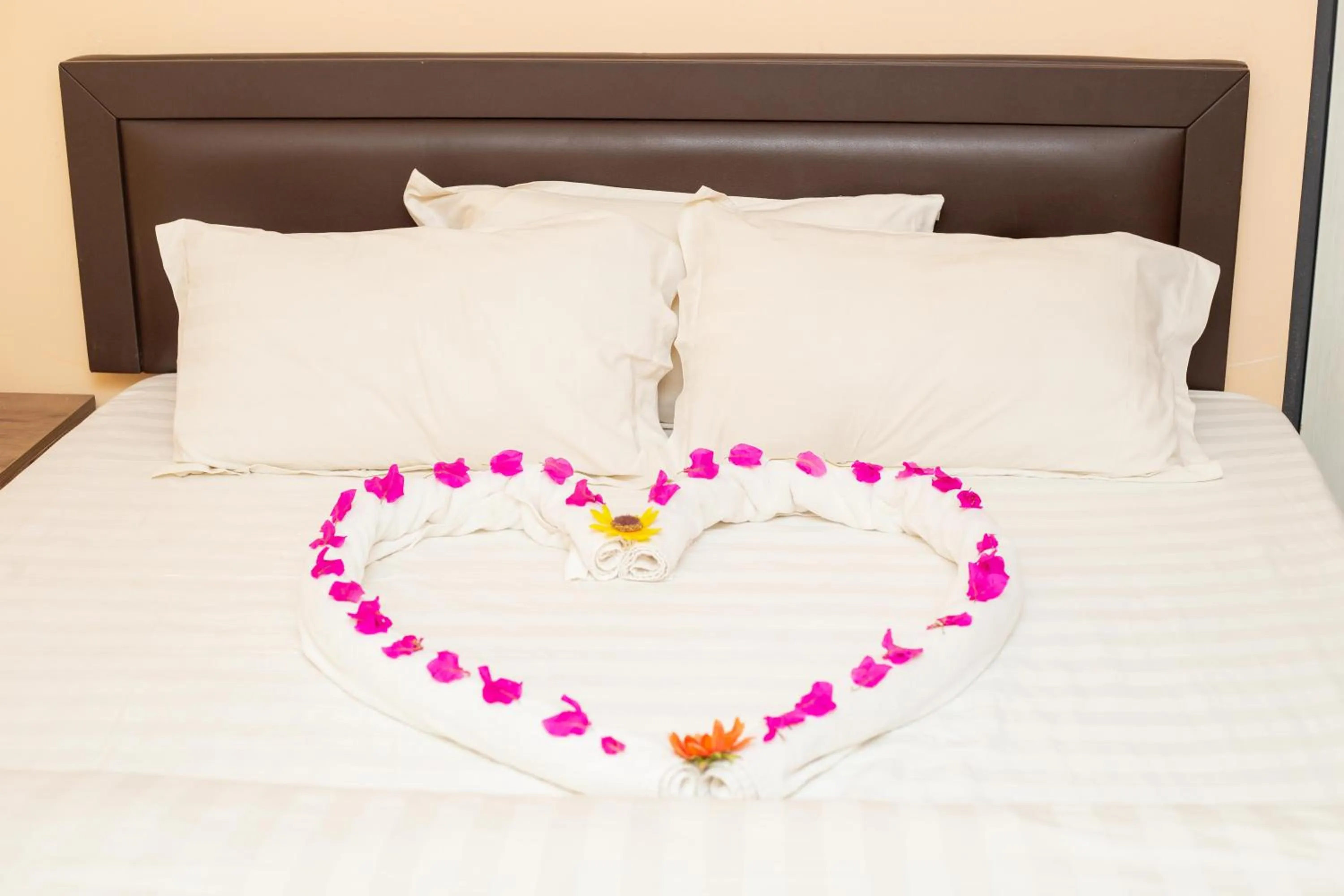 Bed in High Level Apartment