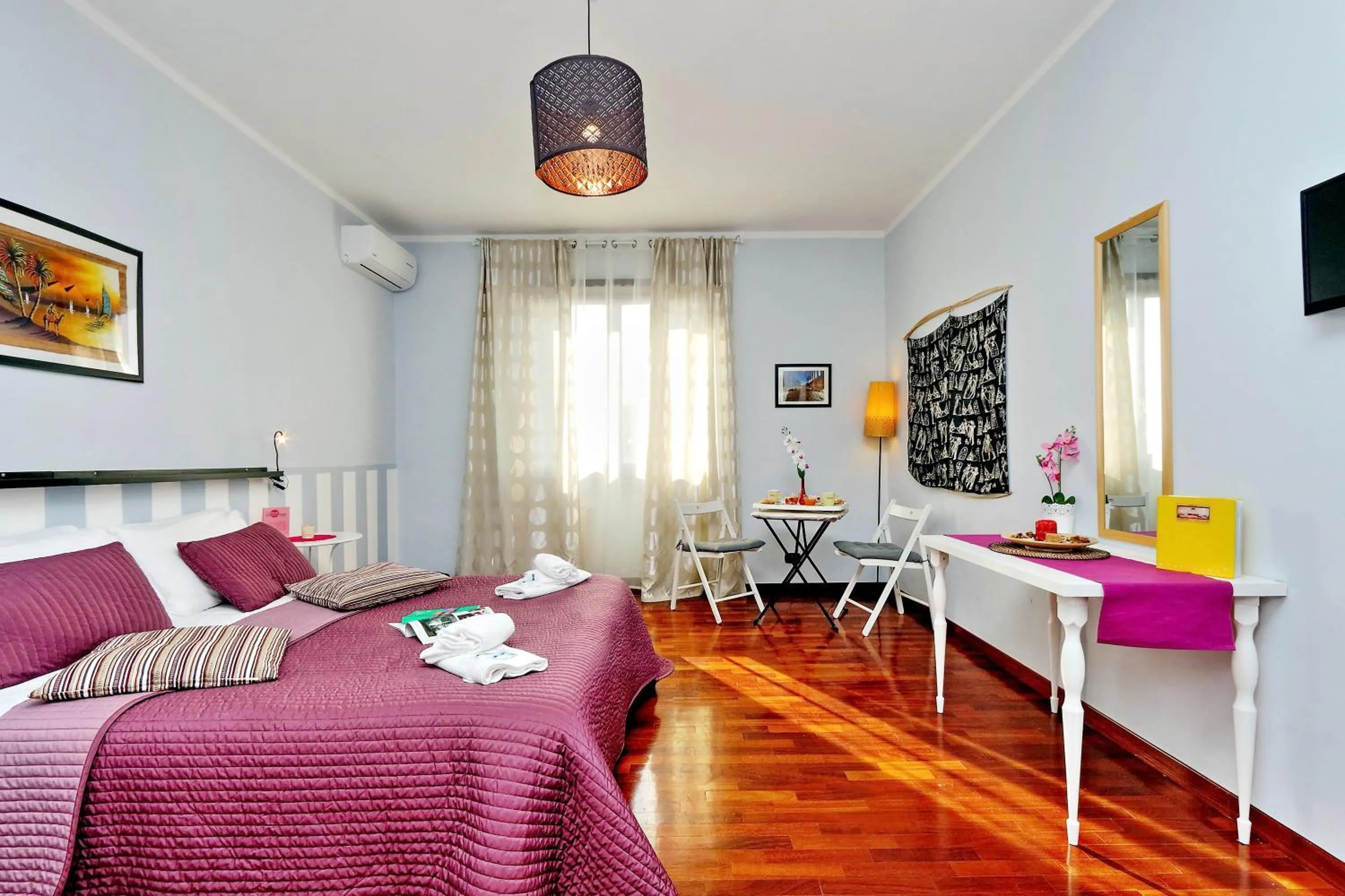 Photo of the whole room in Alloggio Re Di Roma