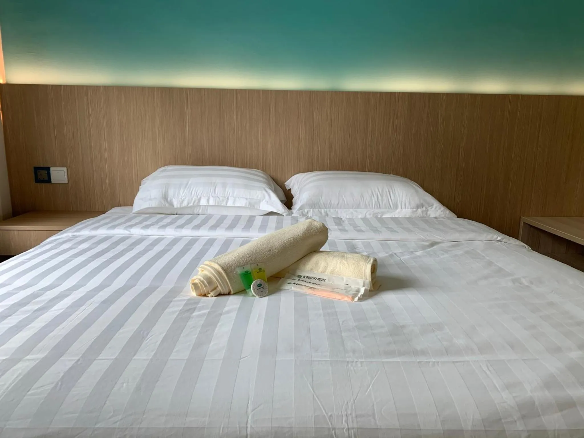 Bed in M Quality Hotel