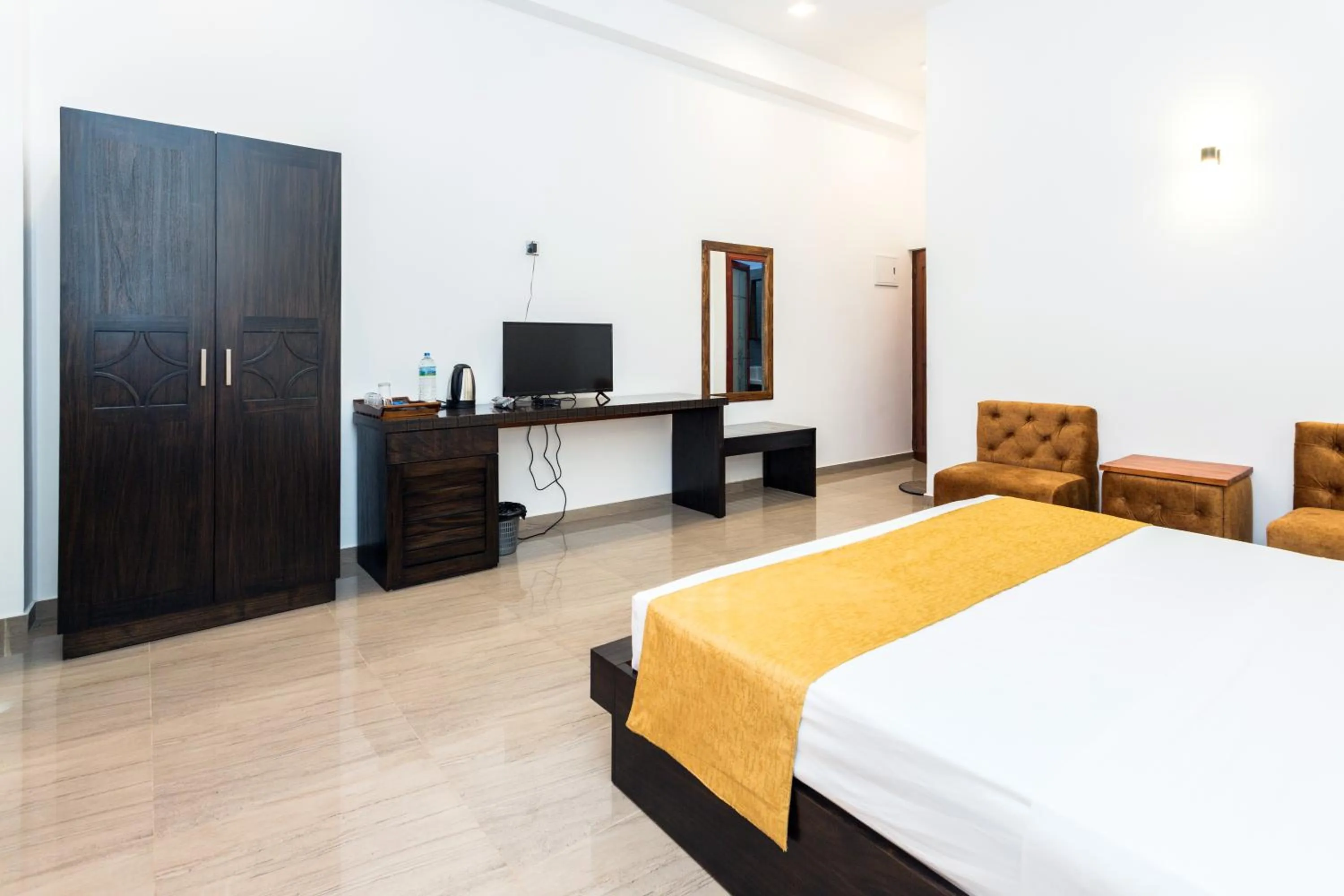 Bed in Polhena Grand Resort & Banquet