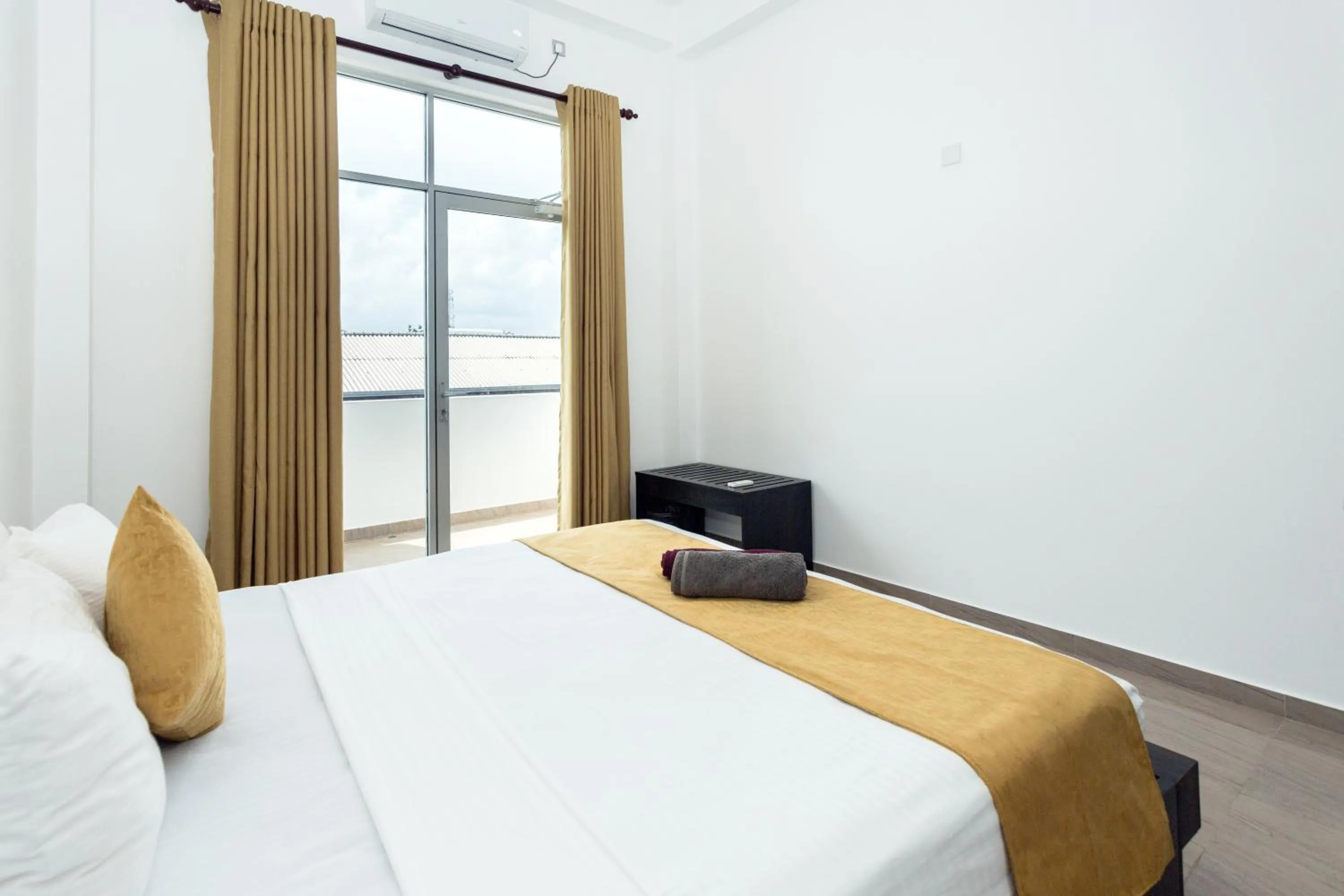 Bed in Polhena Grand Resort & Banquet