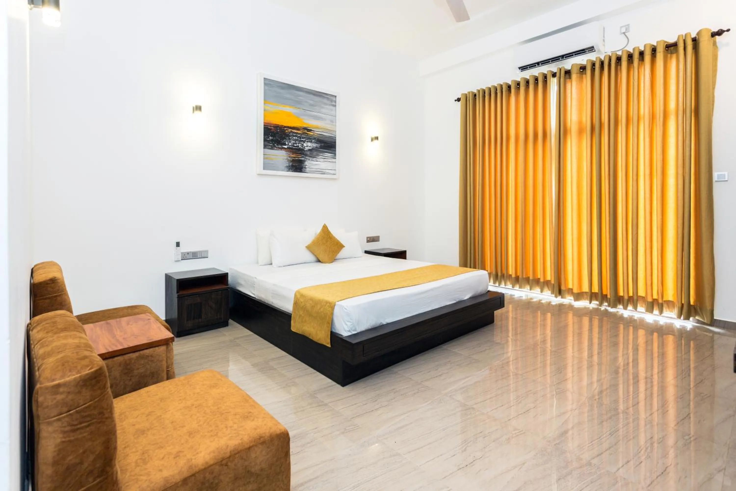 Bed in Polhena Grand Resort & Banquet