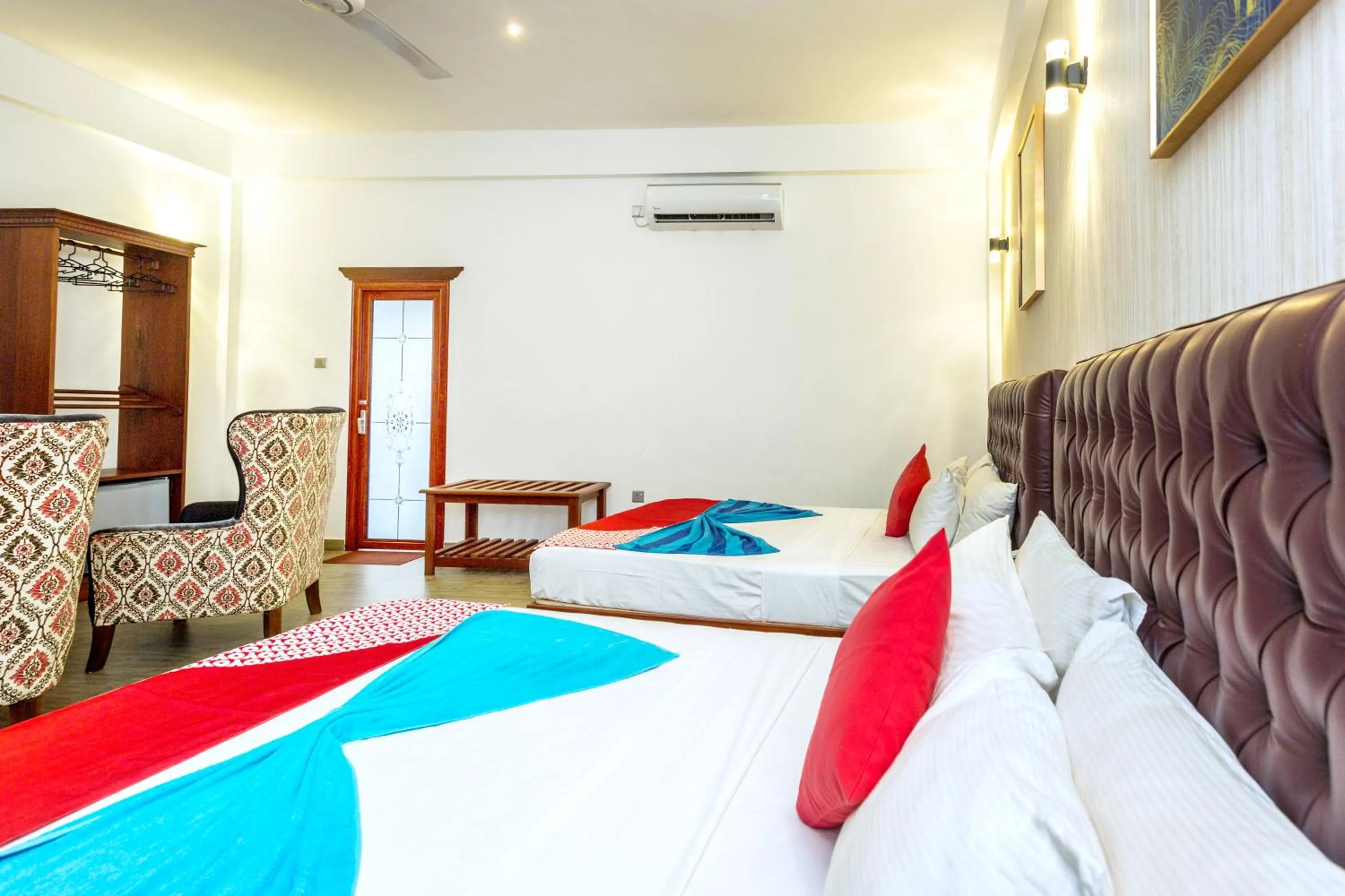 Bed in Polhena Grand Resort & Banquet