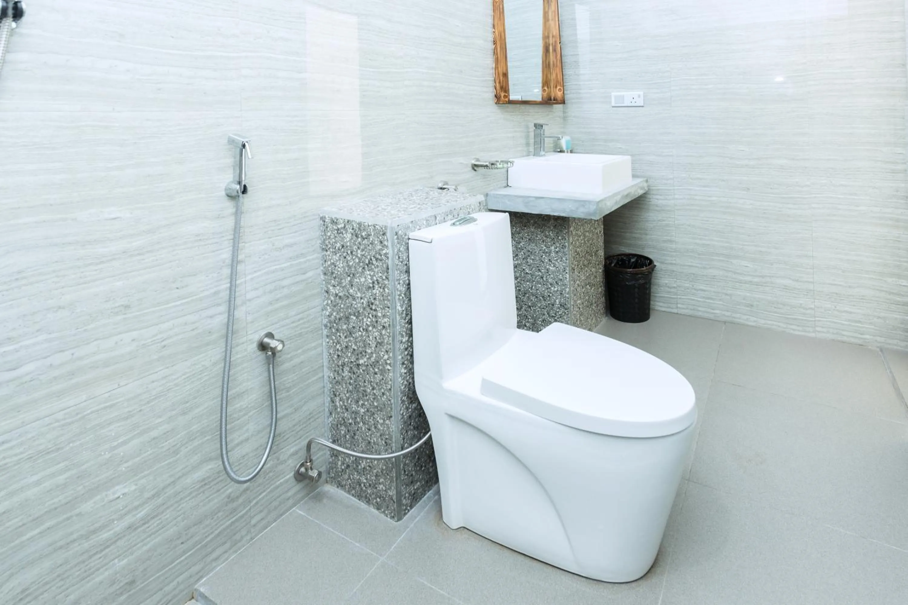 Toilet in Polhena Grand Resort & Banquet