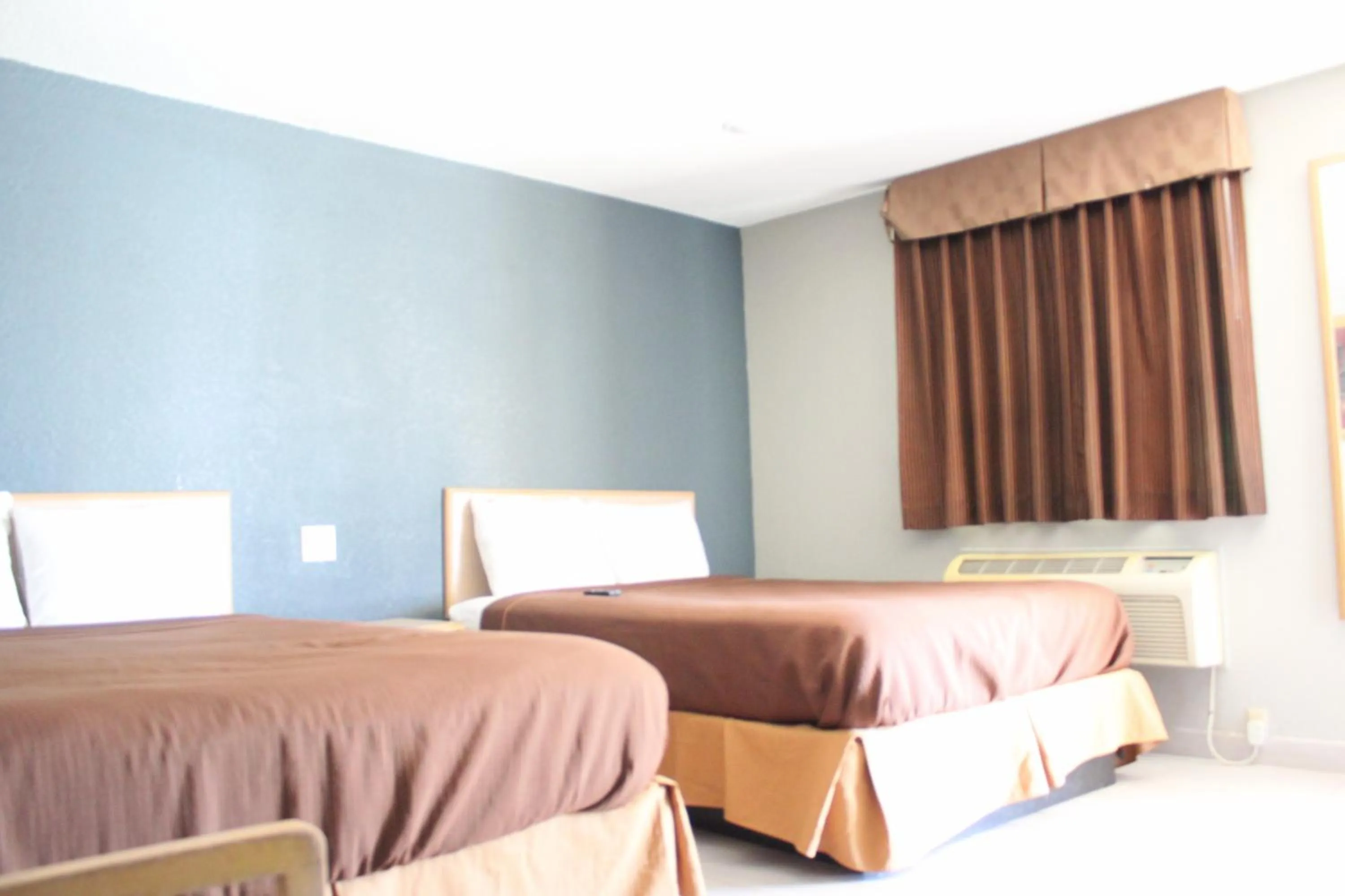 Bed in Village Inn Cotulla