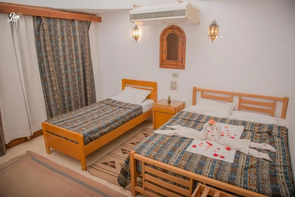 Bed in Lagona Dahab Hotel