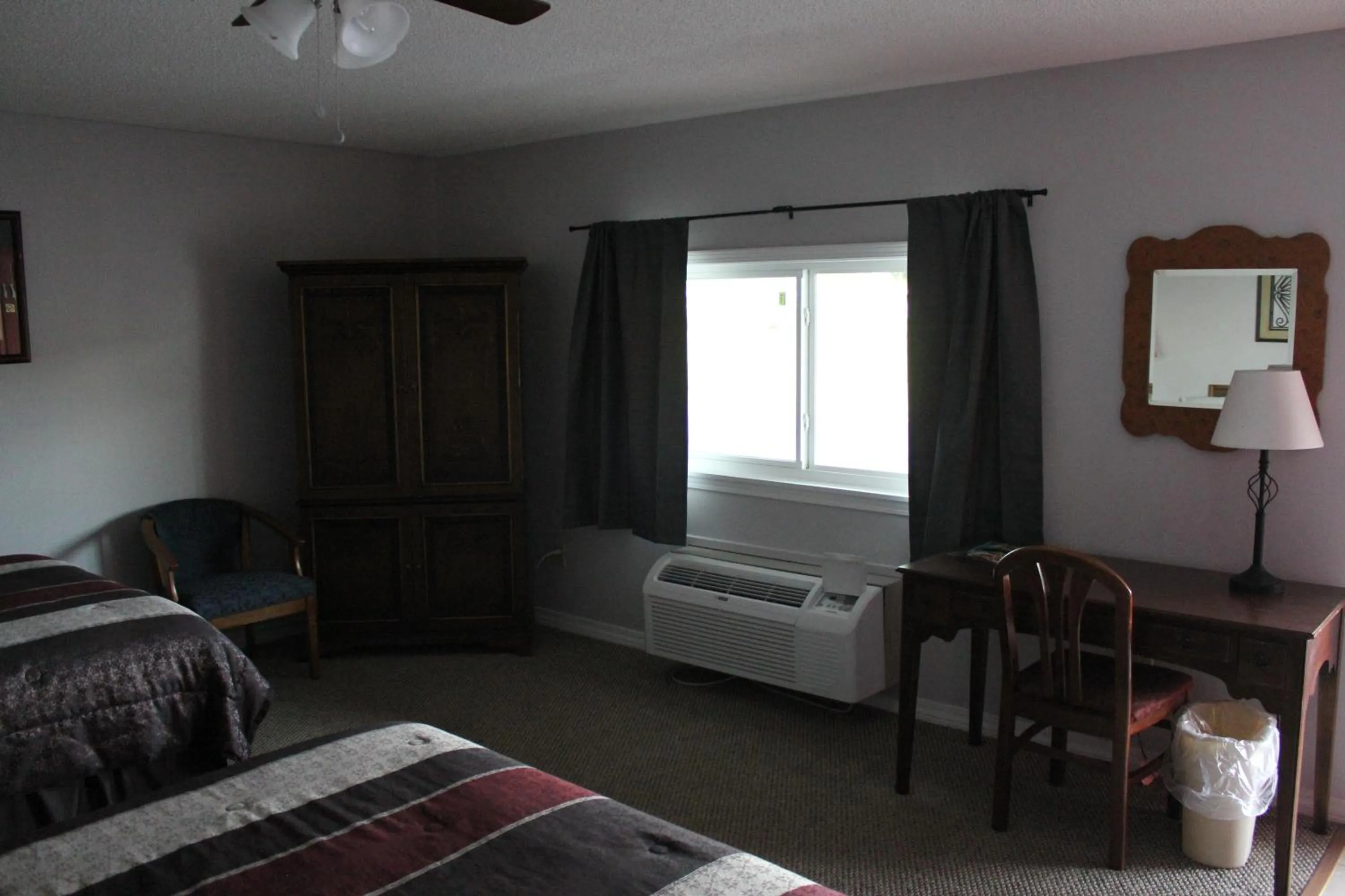 Bed in Brydan Suites