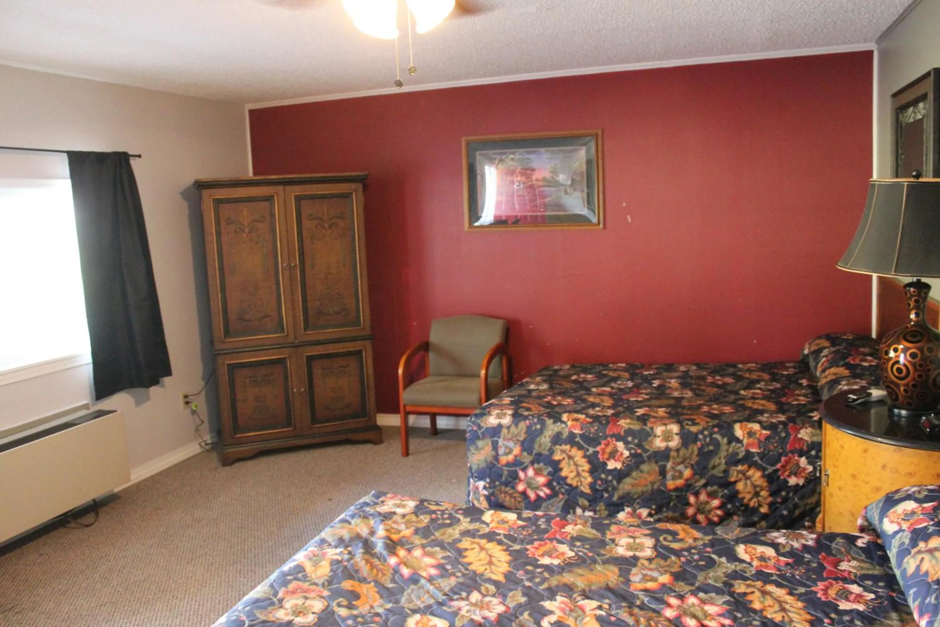 Bed in Brydan Suites