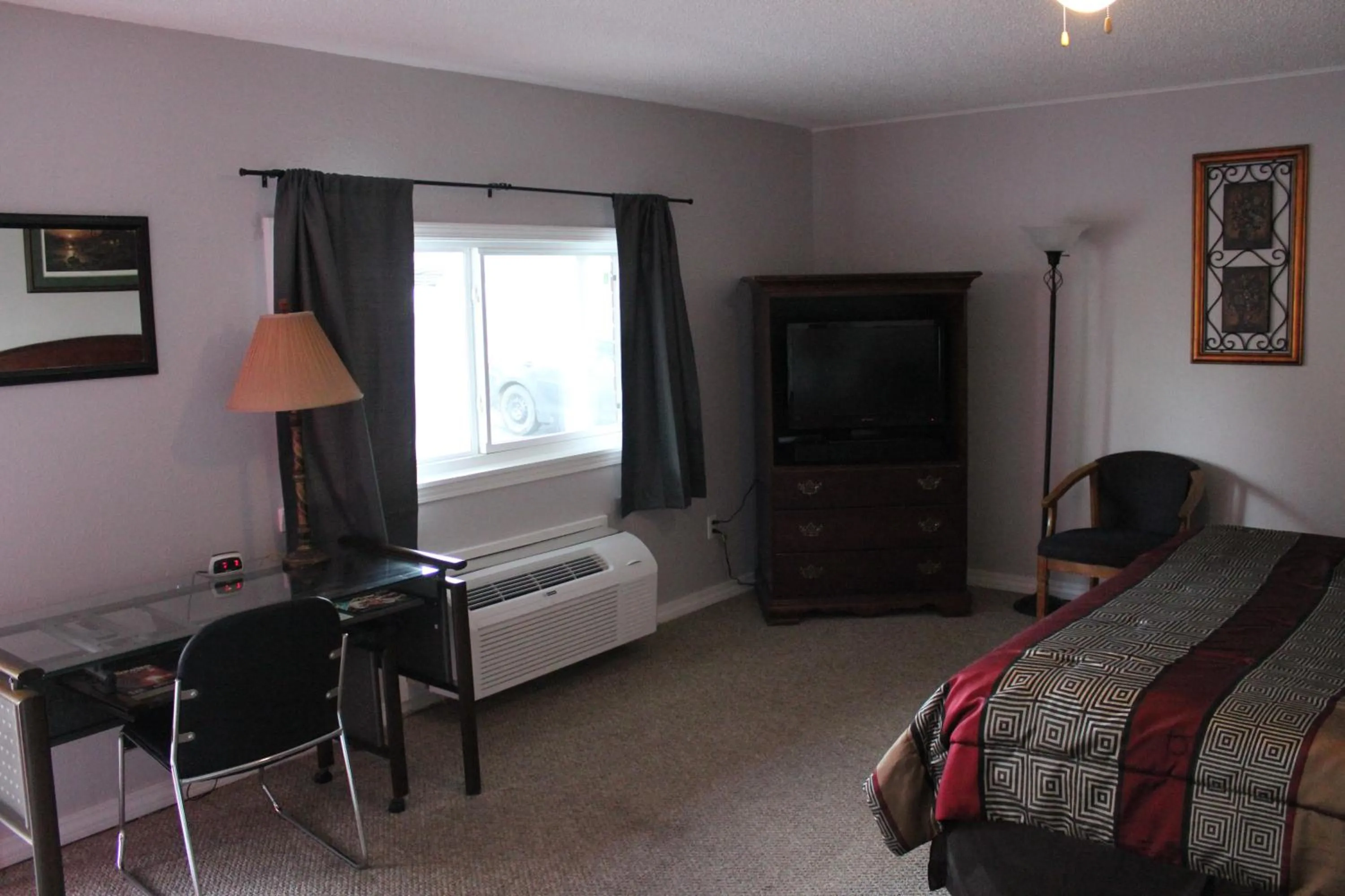 Bed in Brydan Suites