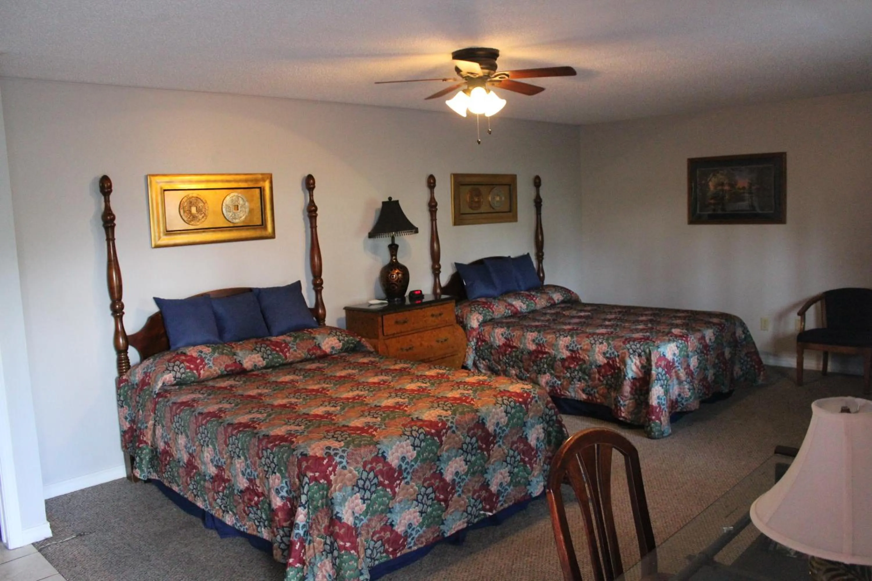 Bed in Brydan Suites