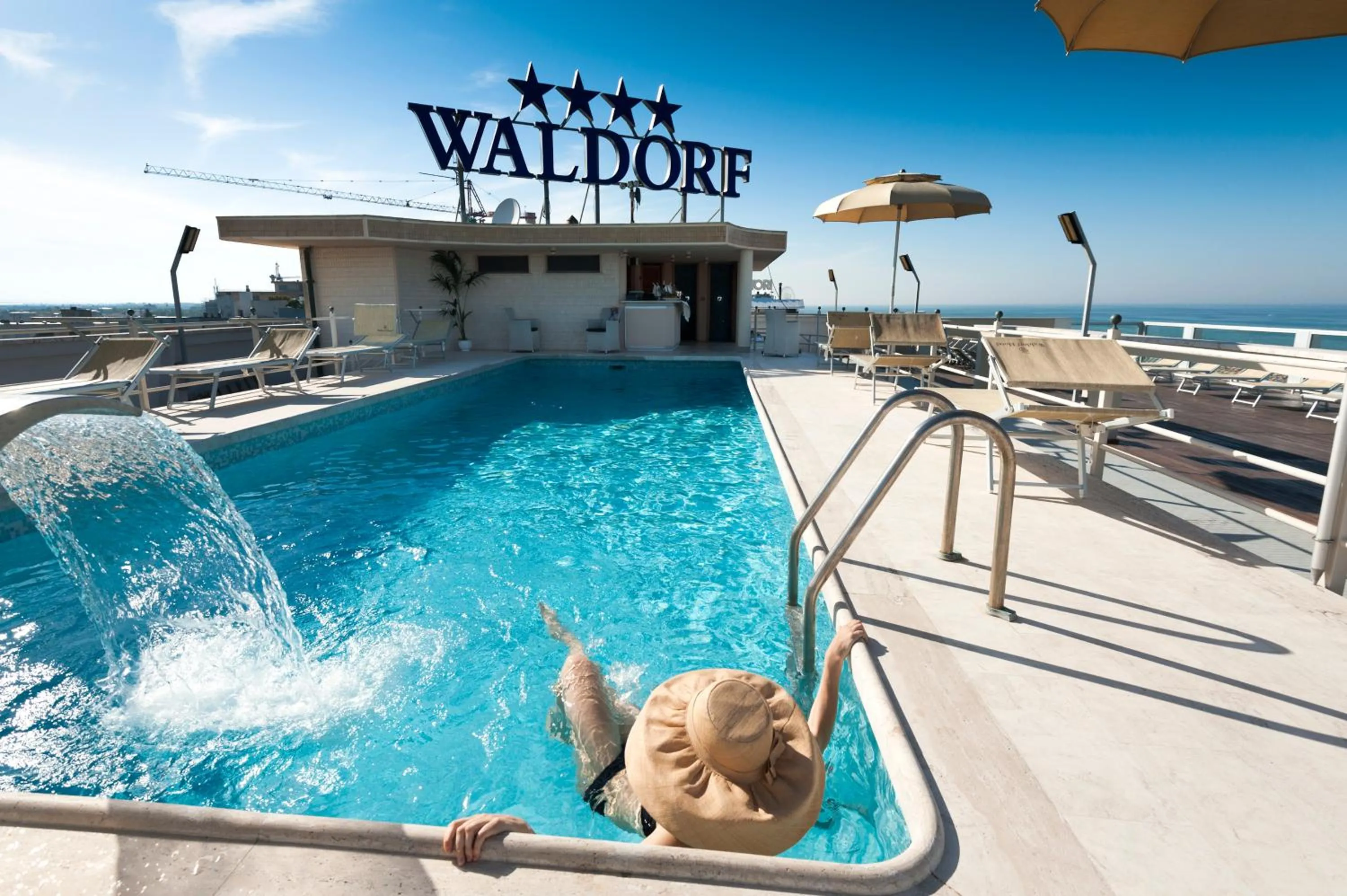 People in Waldorf Suite Hotel