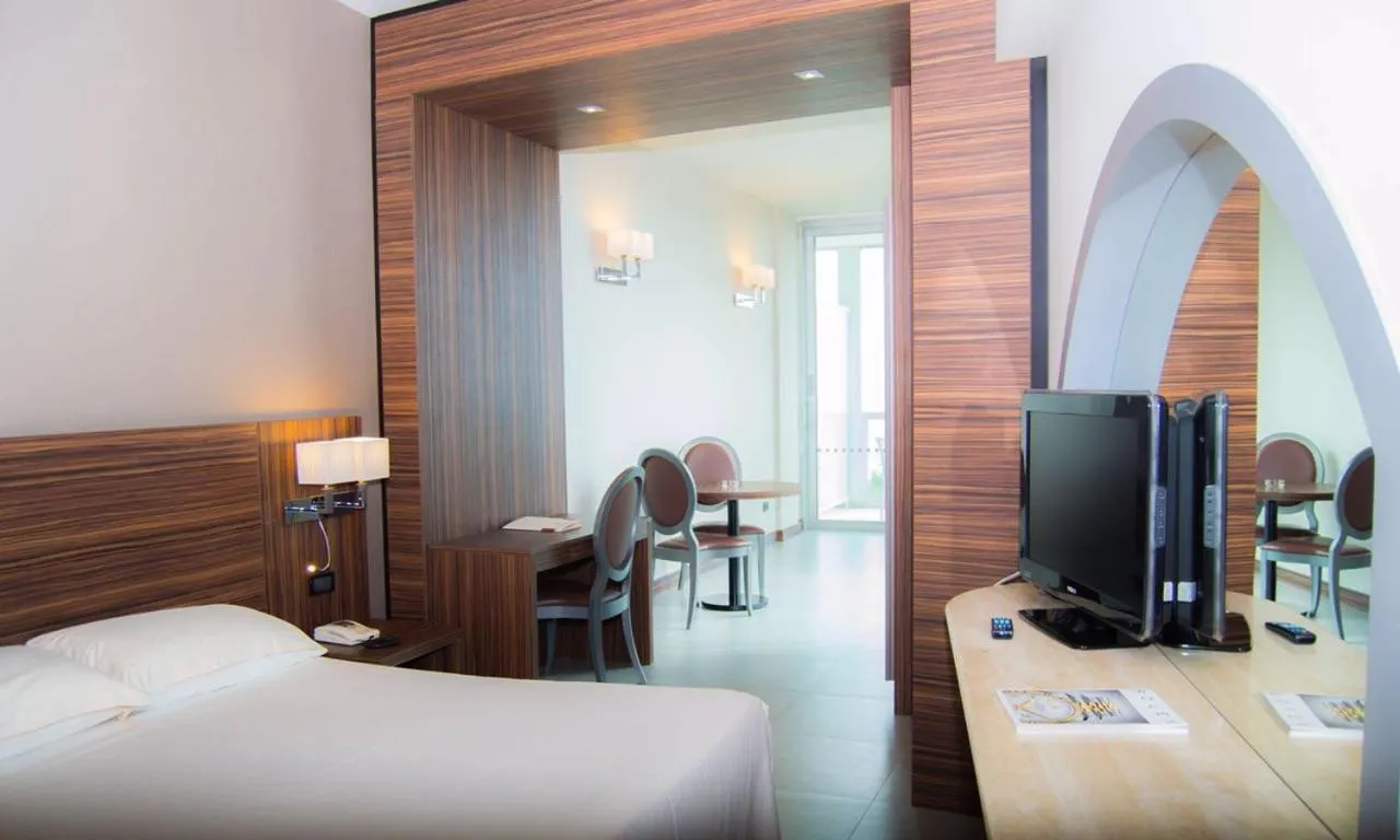 Bed in Waldorf Suite Hotel