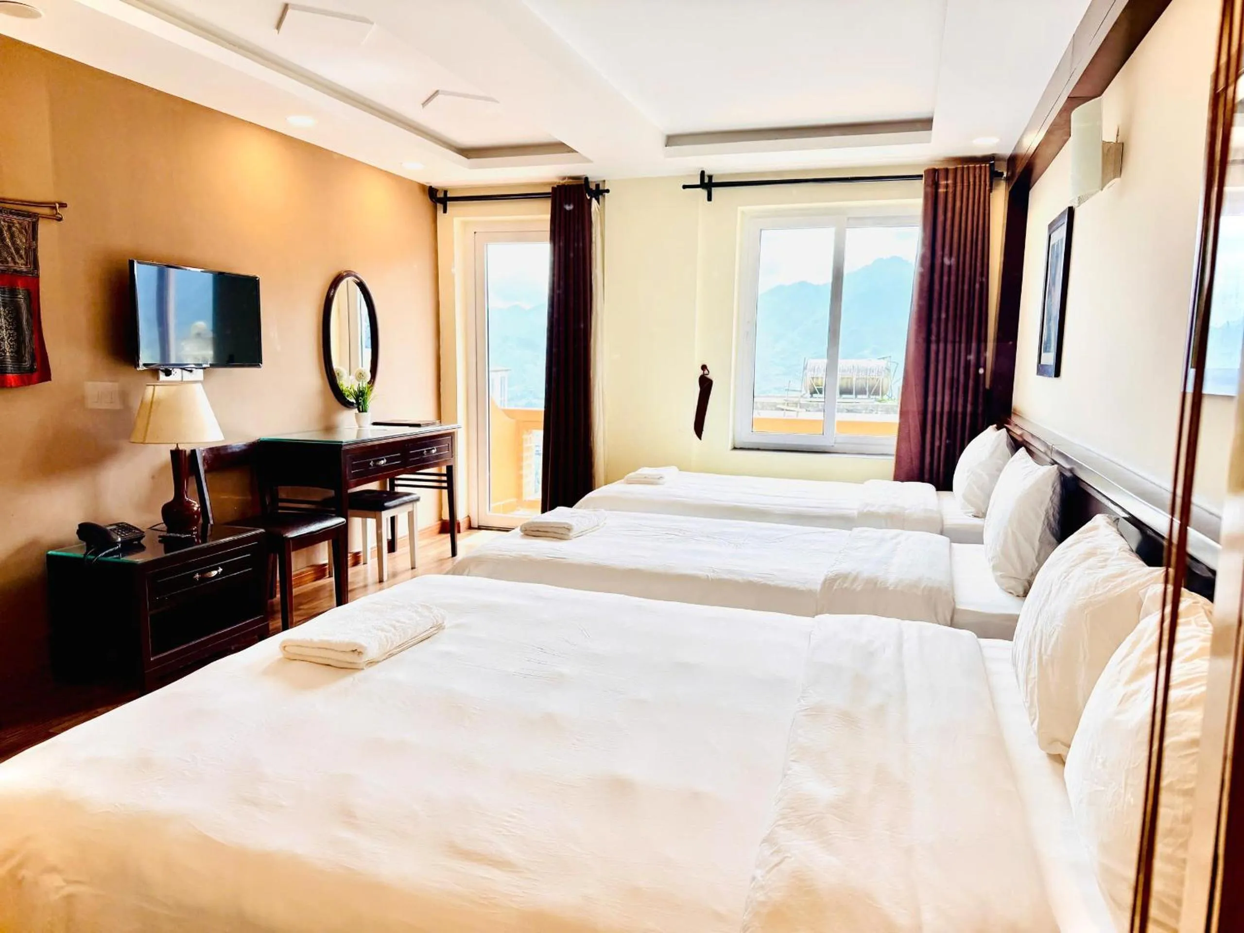 Bed in Cat Cat View Hotel