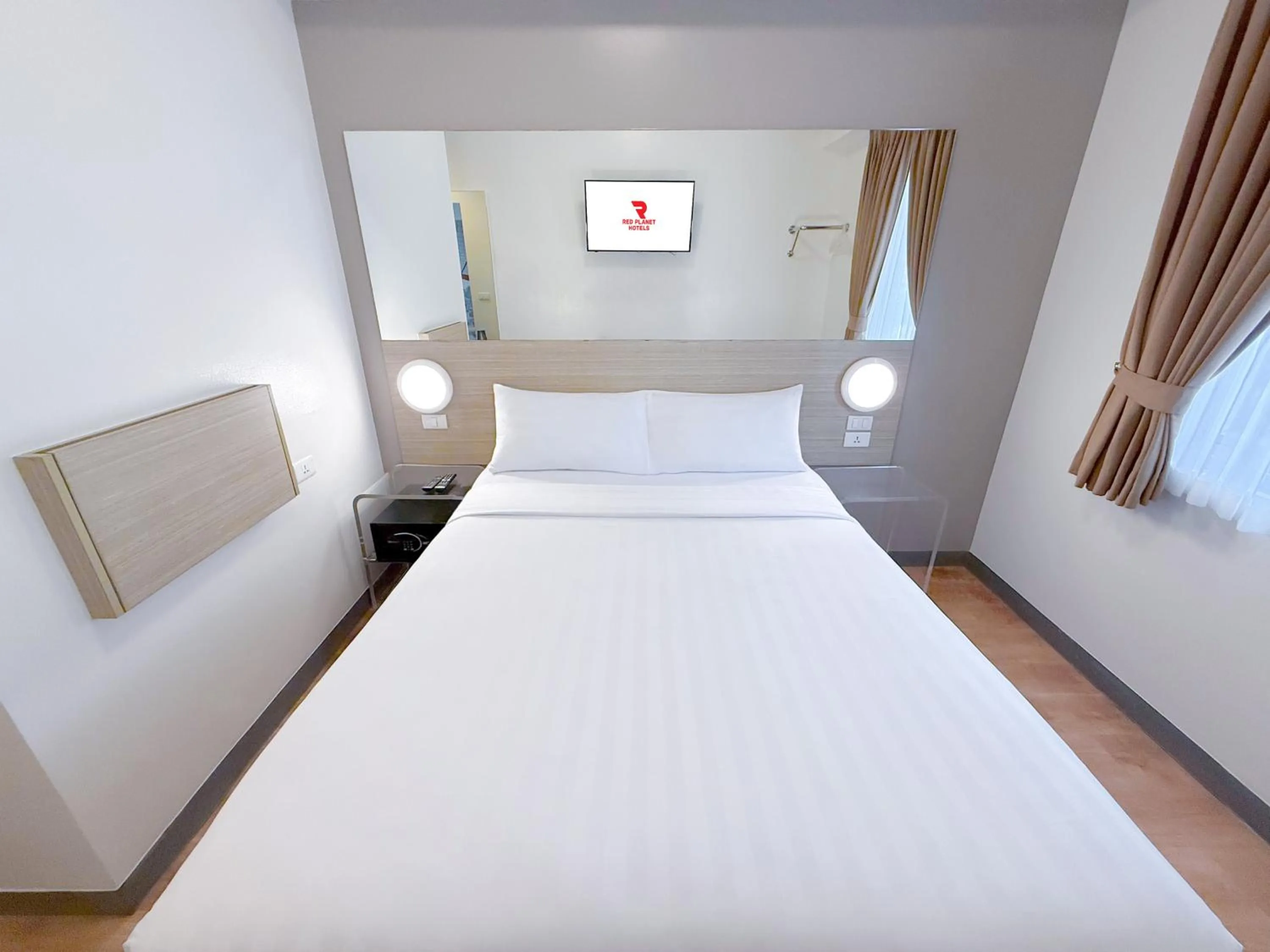 Bed in Red Planet Ortigas