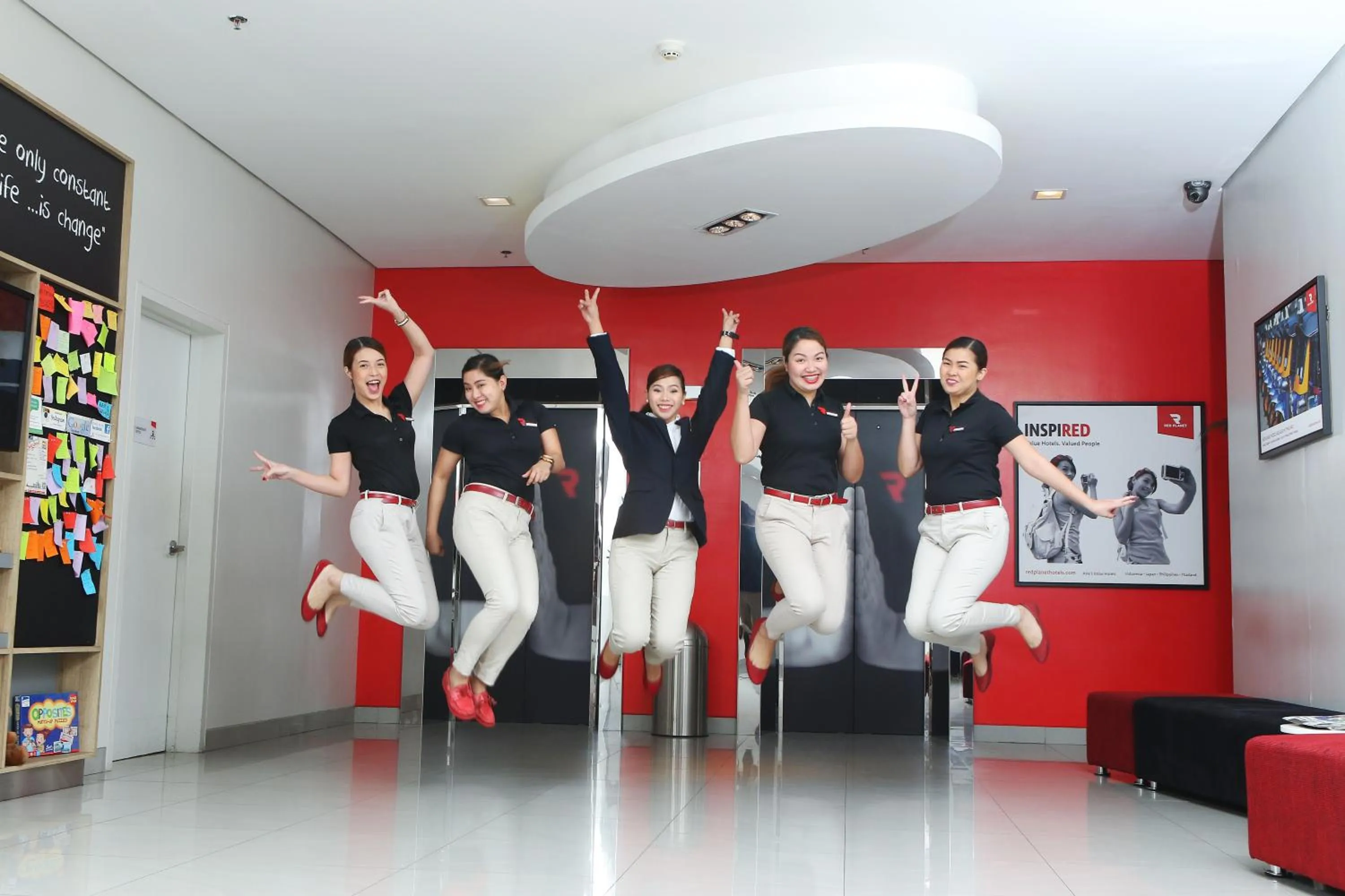Staff in Red Planet Ortigas