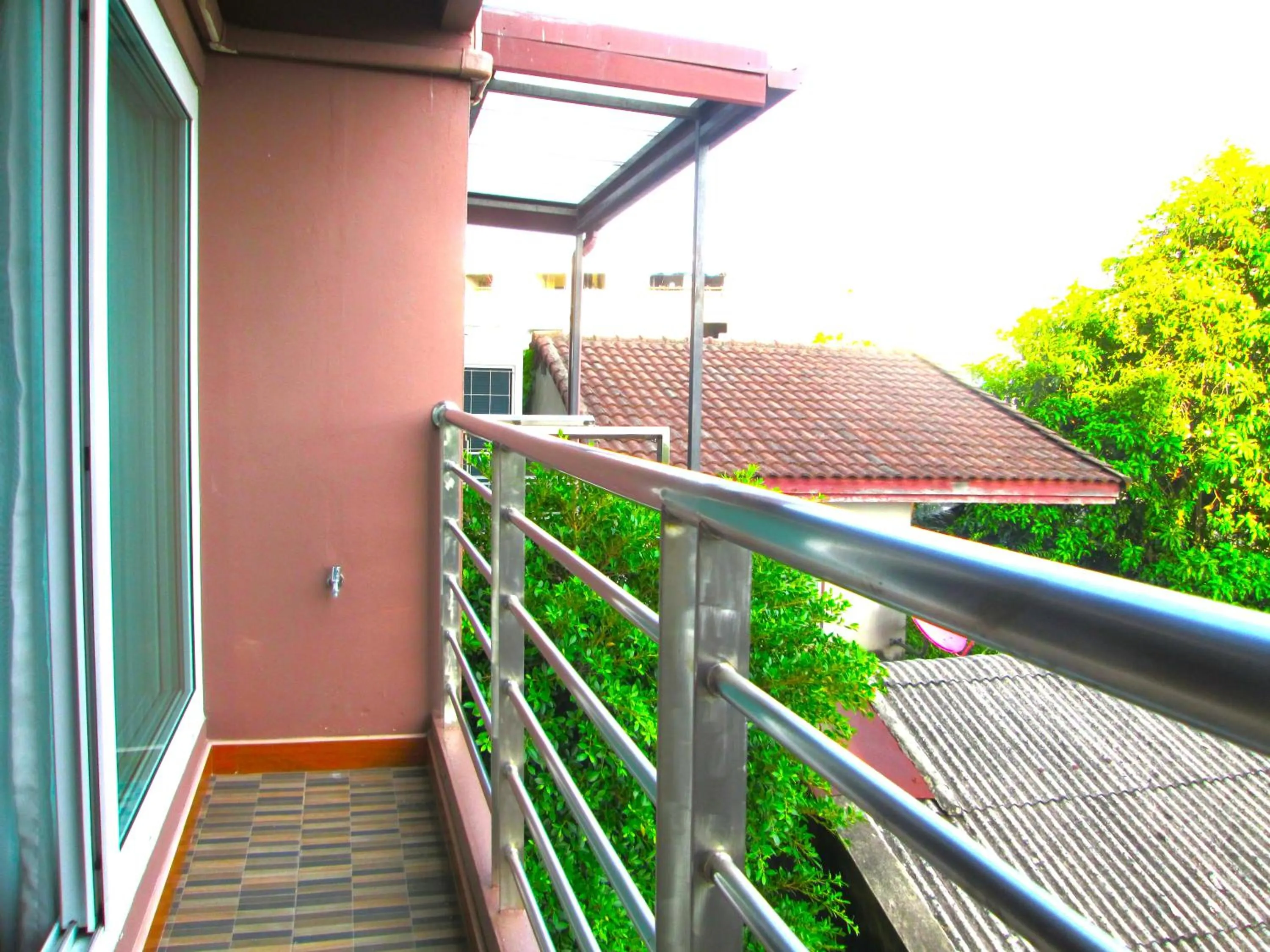 Balcony/Terrace in Nest n Rest Hotel