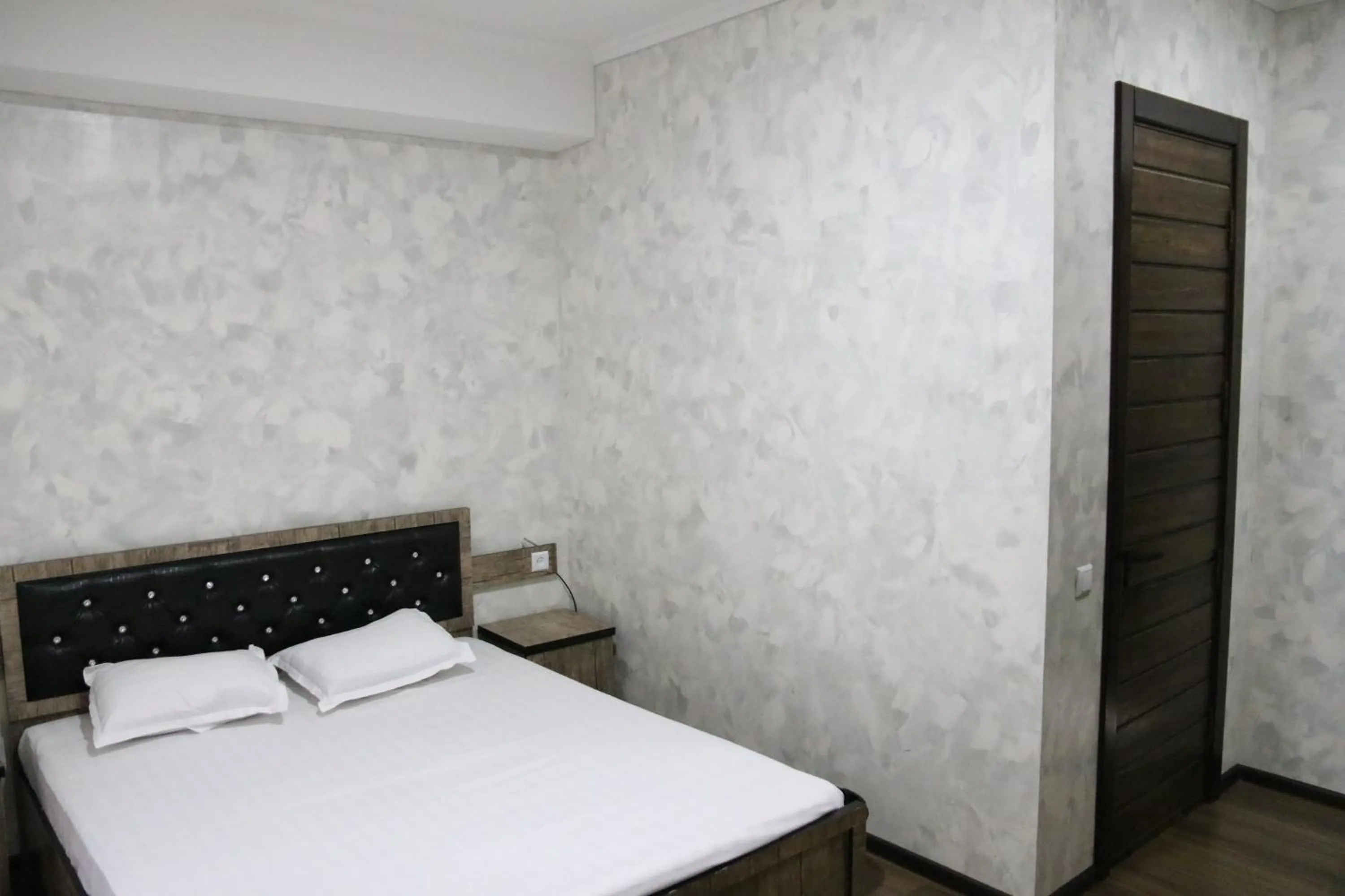 Bed in Orion Hotel Tashkent