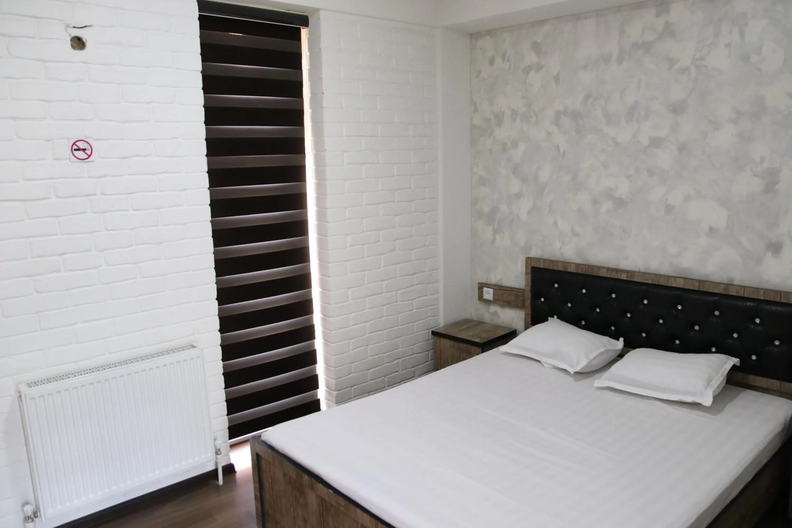 Bed in Orion Hotel Tashkent