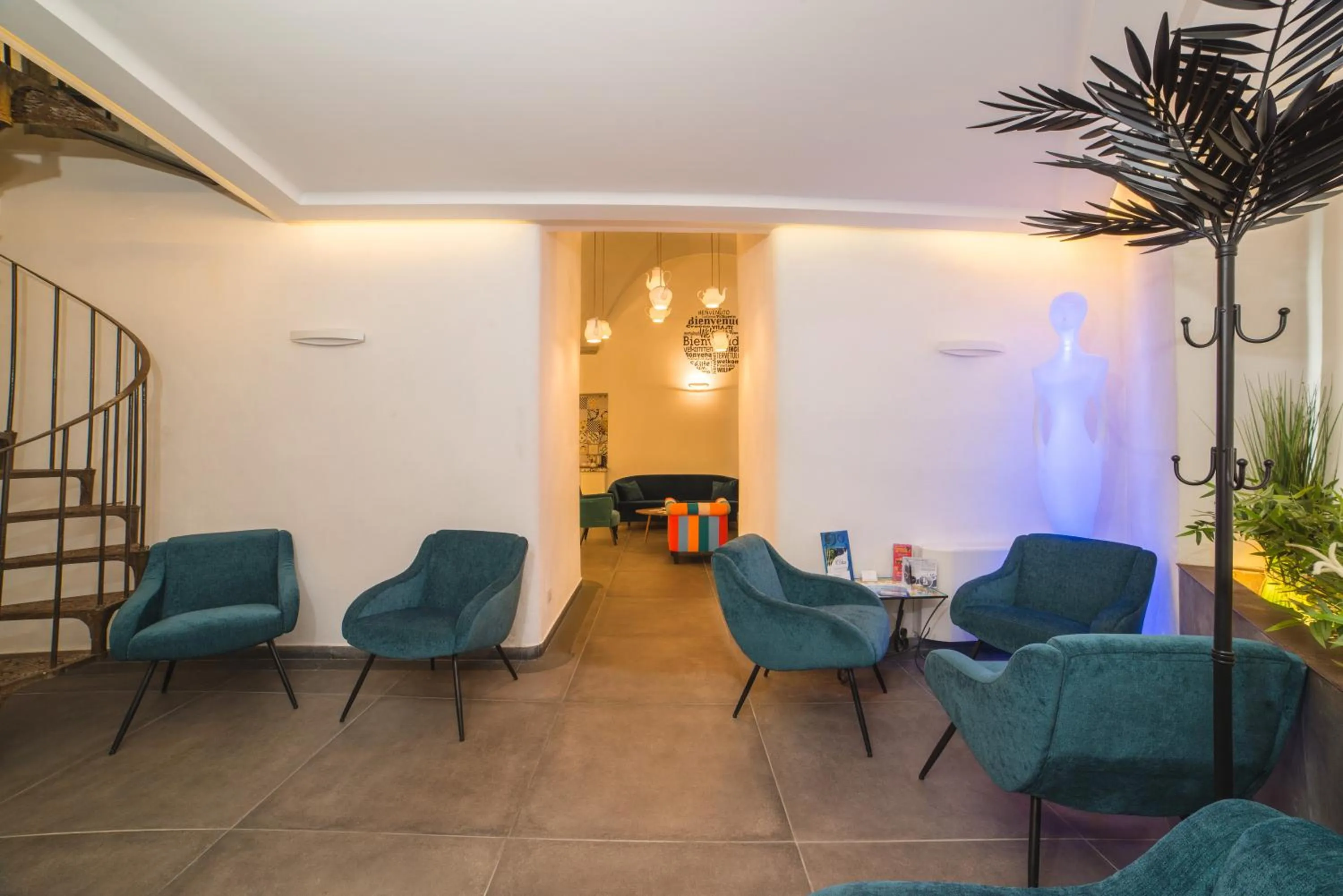 Communal lounge/ TV room in Airone Hotel