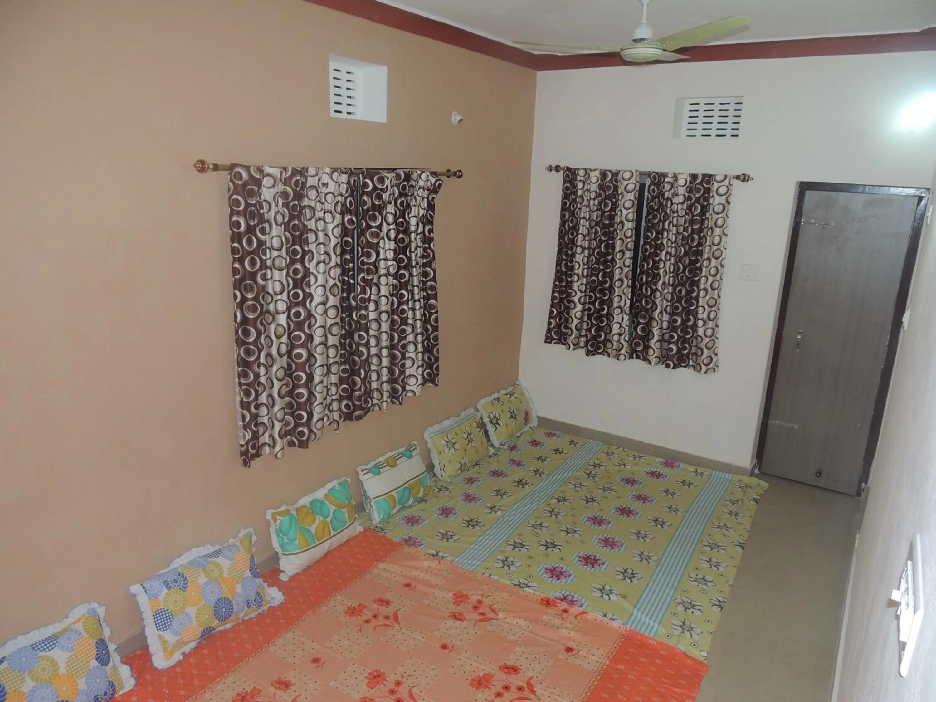 Photo of the whole room, Bed in Surya Inn