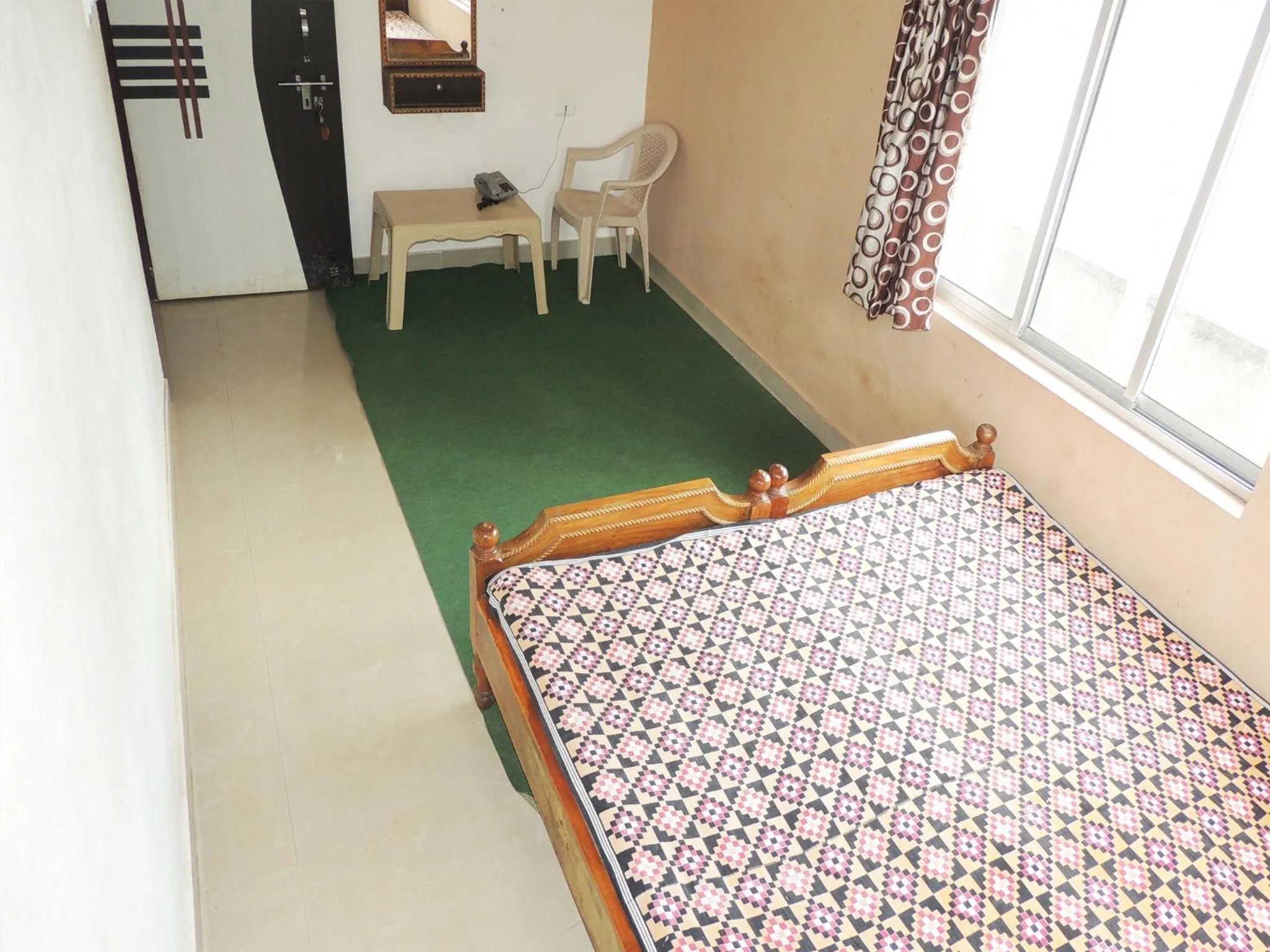 Photo of the whole room, Bed in Surya Inn