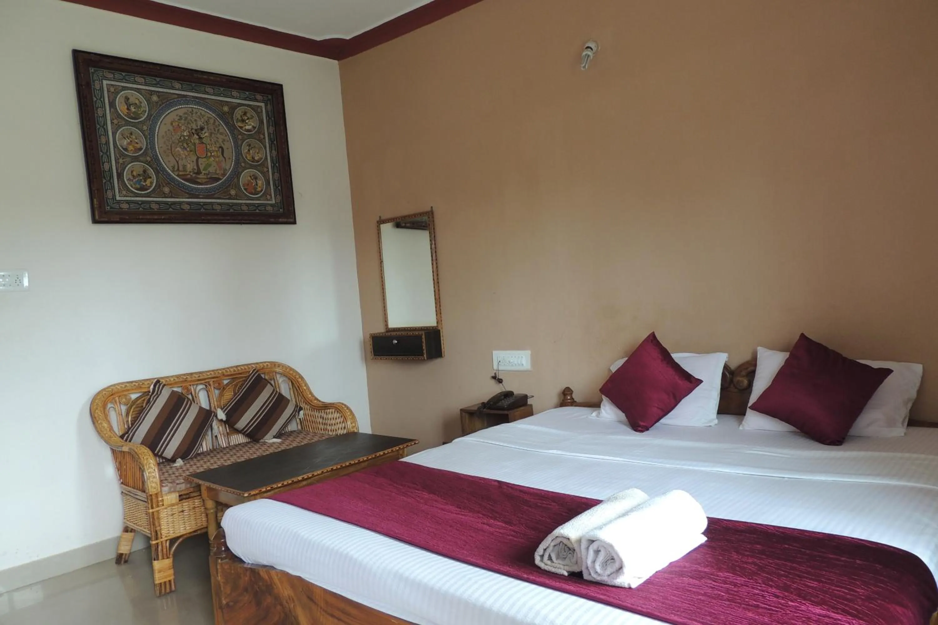 Photo of the whole room, Bed in Surya Inn