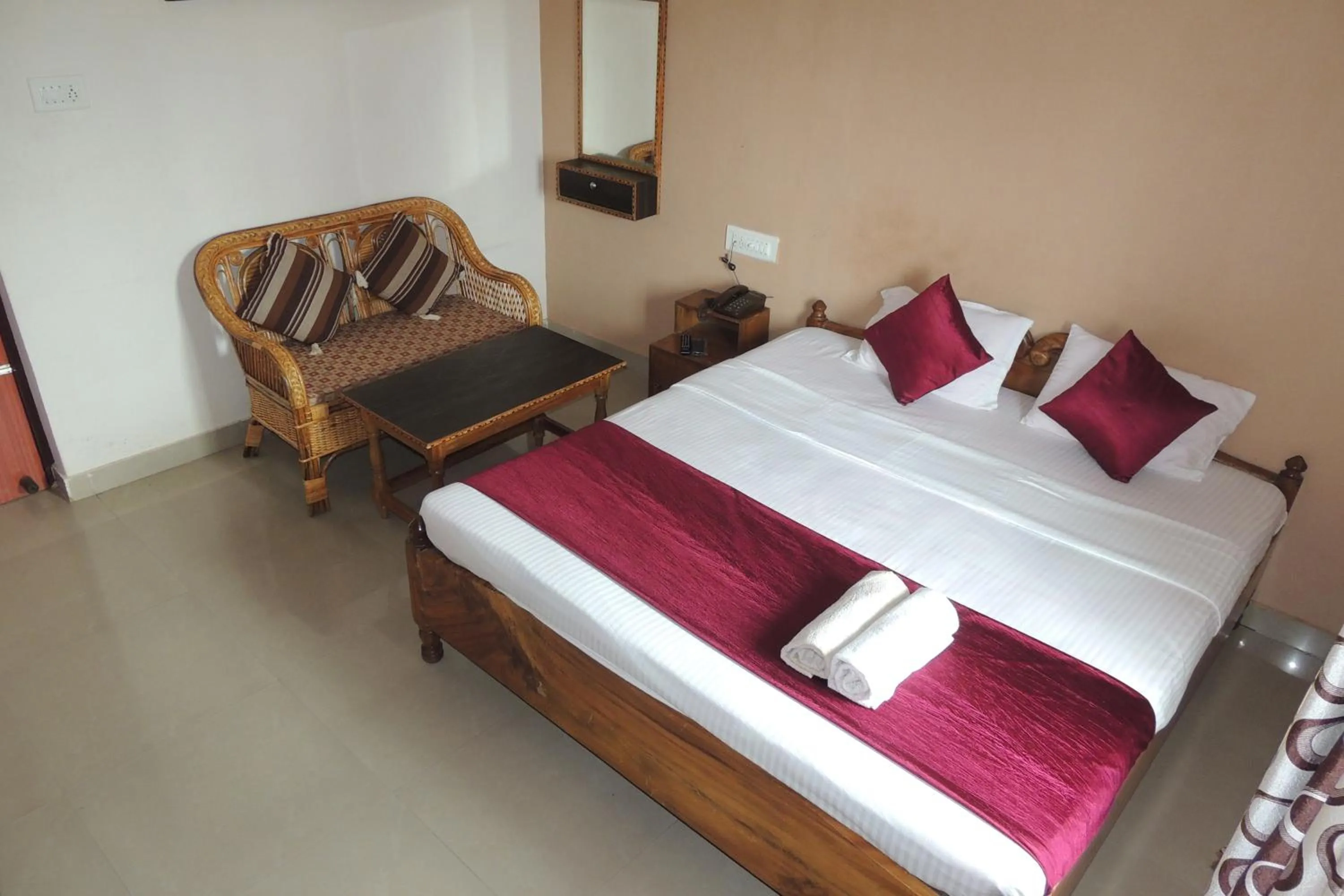 Photo of the whole room, Bed in Surya Inn