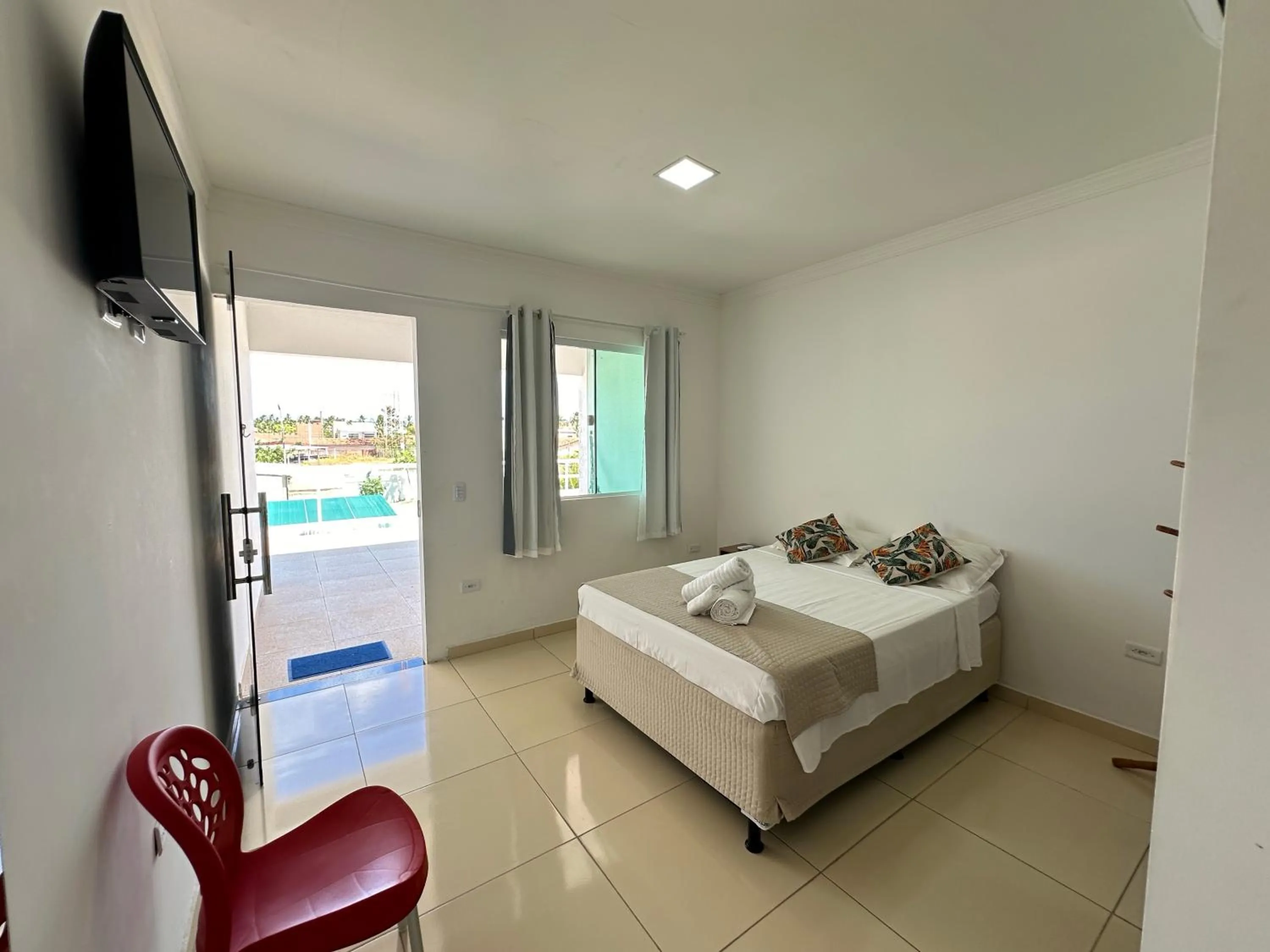 Bed in Dellas Pousada