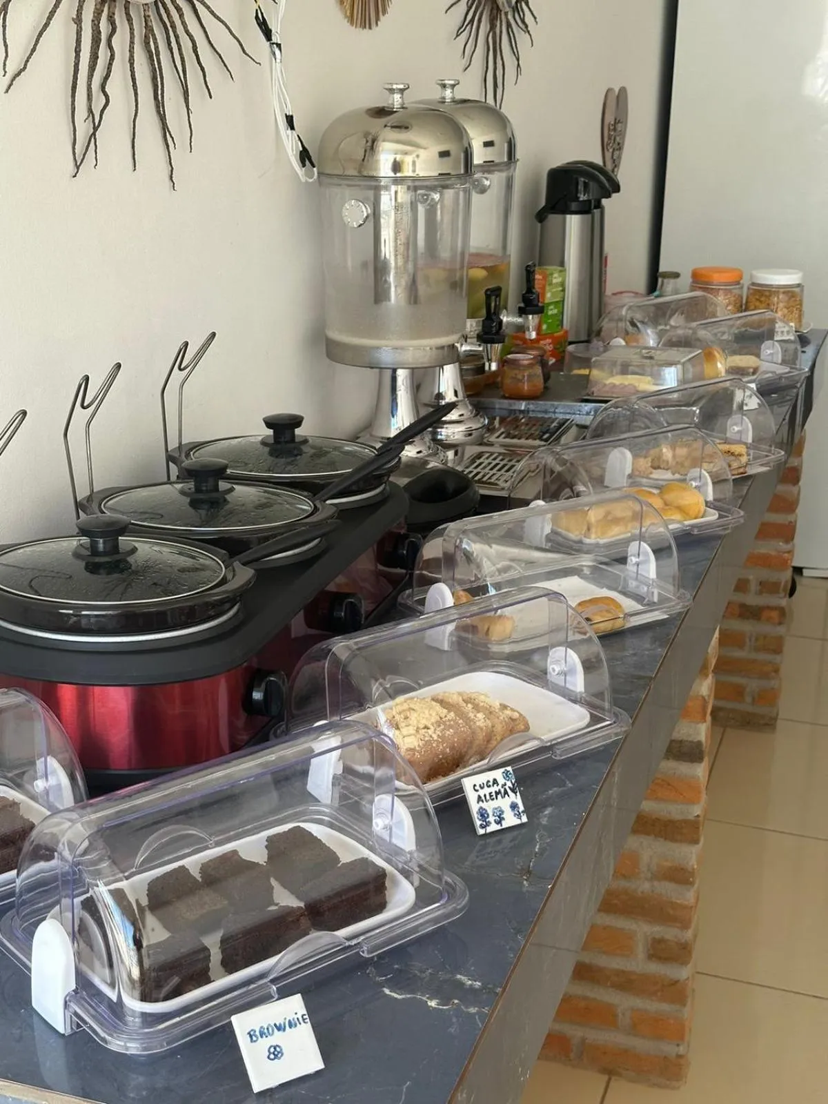 Buffet breakfast in Dellas Pousada