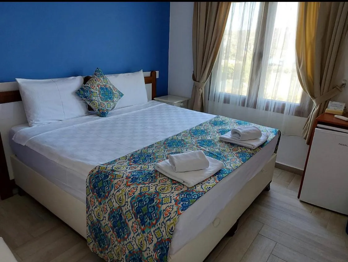 Photo of the whole room, Bed in Eleni (L&E) Pansiyon