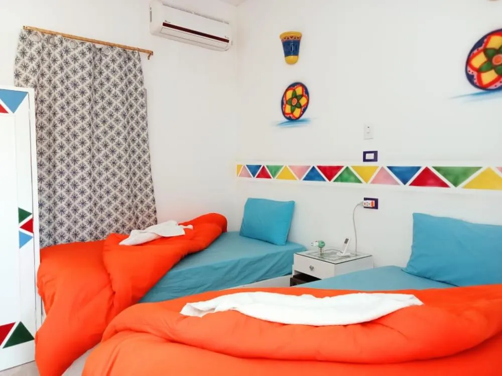 Bed in Lawanda Nubian B&B