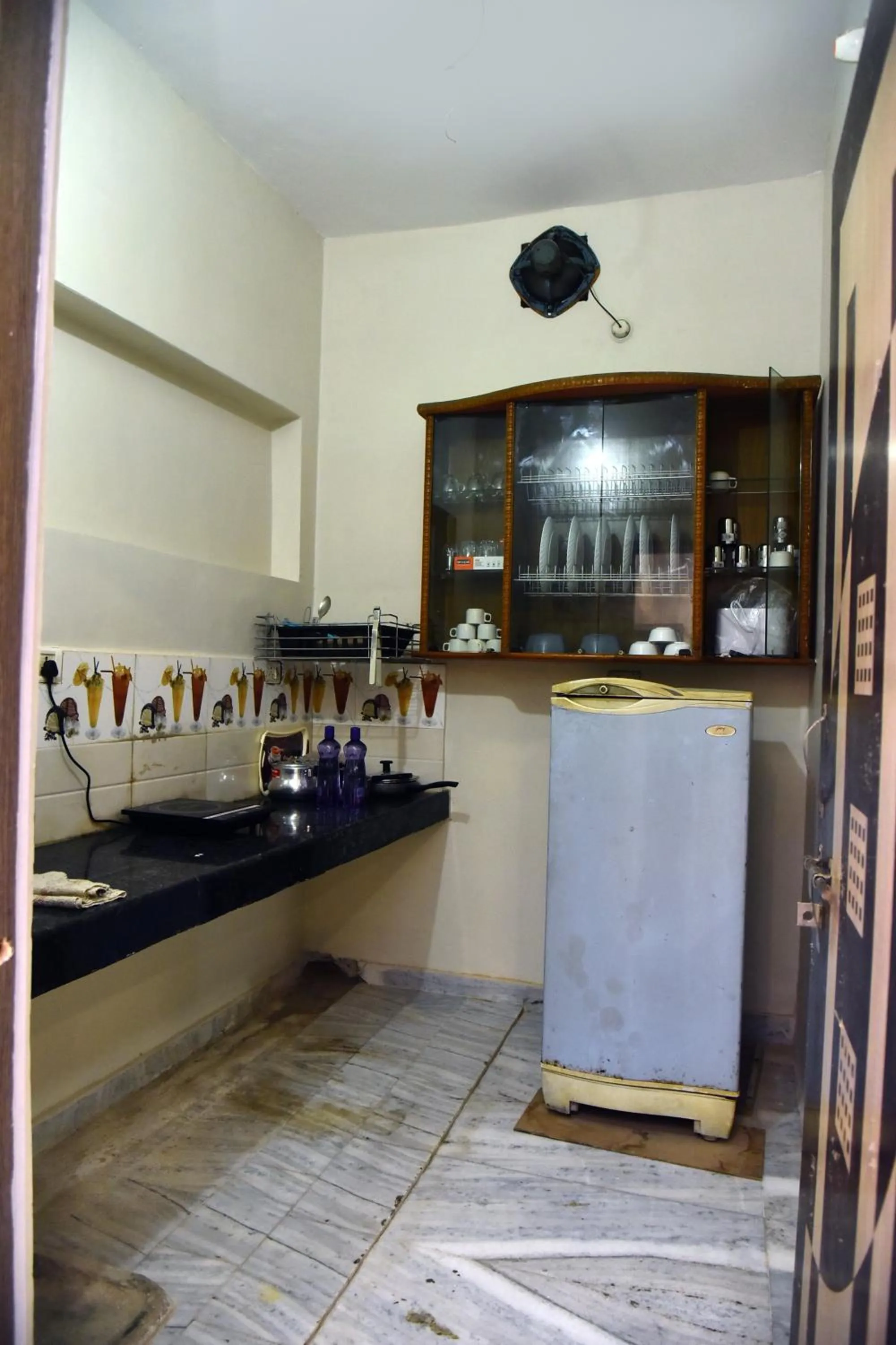 Kitchen or kitchenette in Bluebells Varanasi