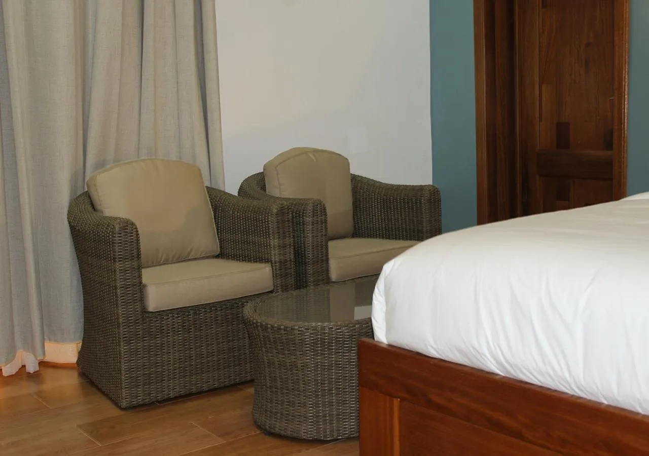 Seating area, Bed in The Little Hill Boutique Hotel